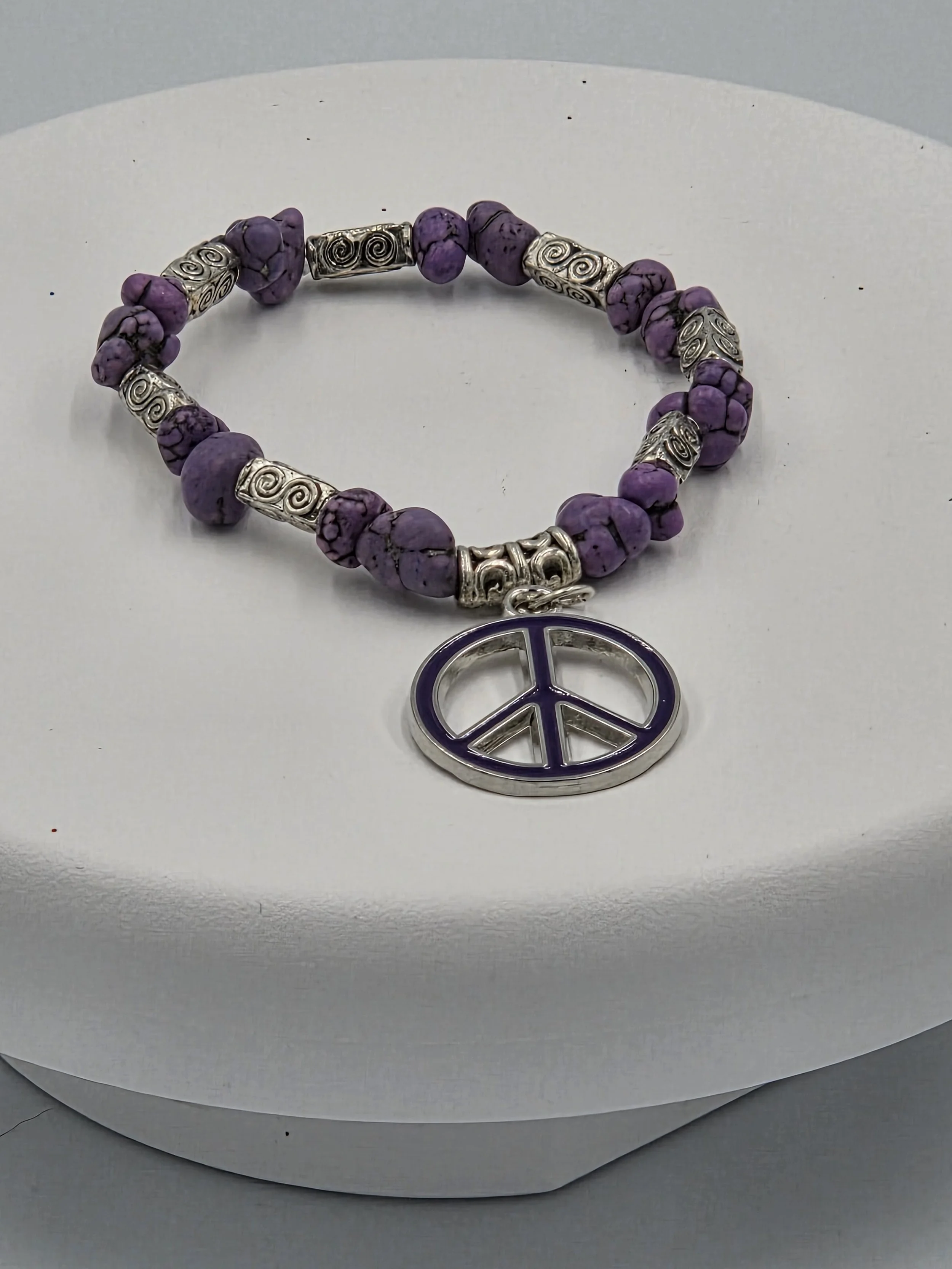 OOAK purple howlite bracelet with celtic tubes and peace charm.