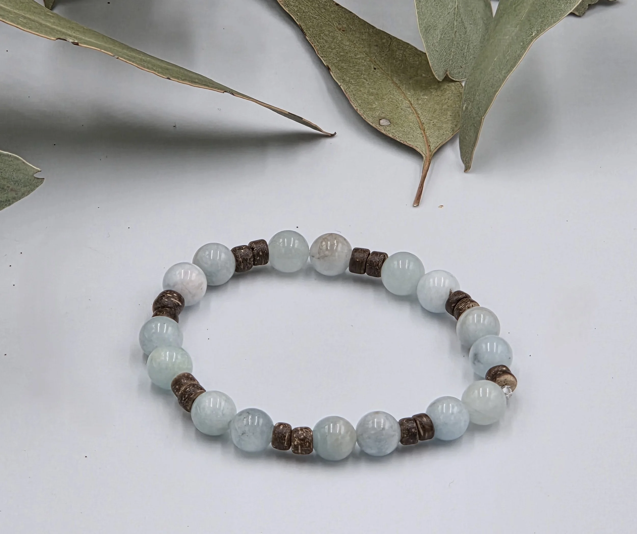 OOAK premium aquamarine and fine coconut disc alternating elastic bracelet.