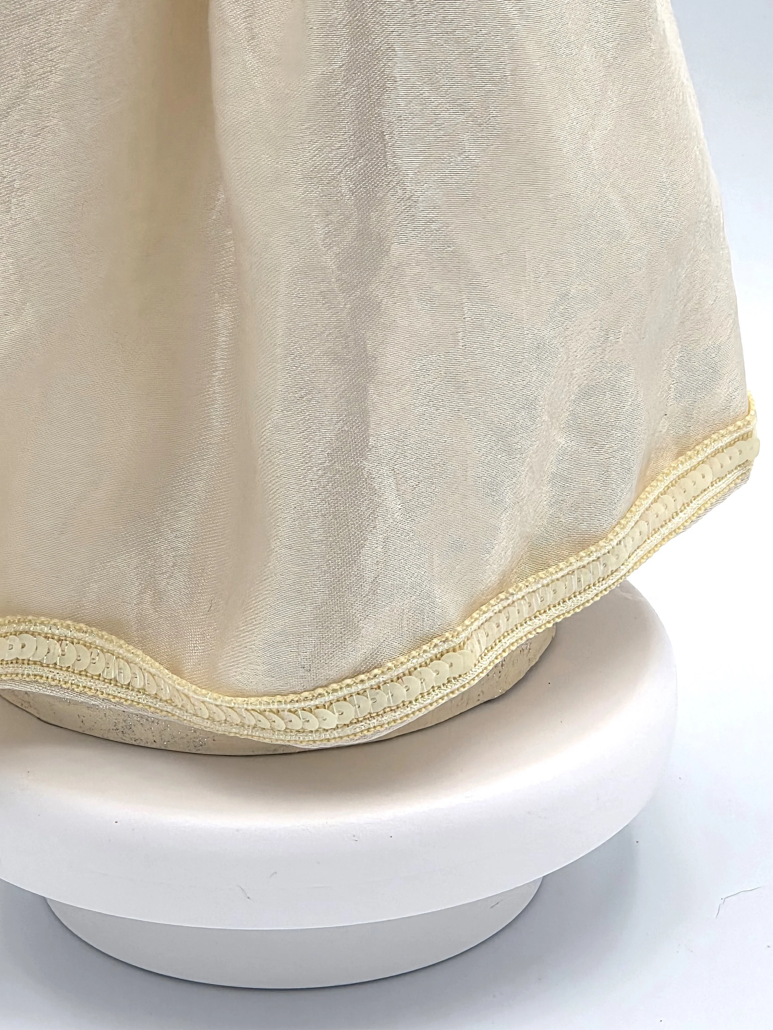 close up of sequinned hem