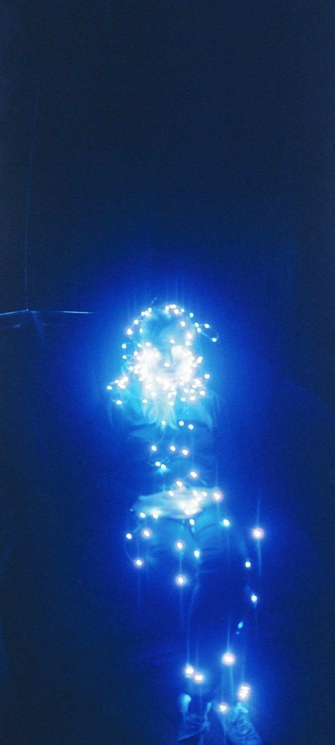 Dot Allison
photo shoot for 'Heart Shaped Scars'
Edinburgh
2012
Wrapped in white fairy lights in a blue room on my panoramic camera.