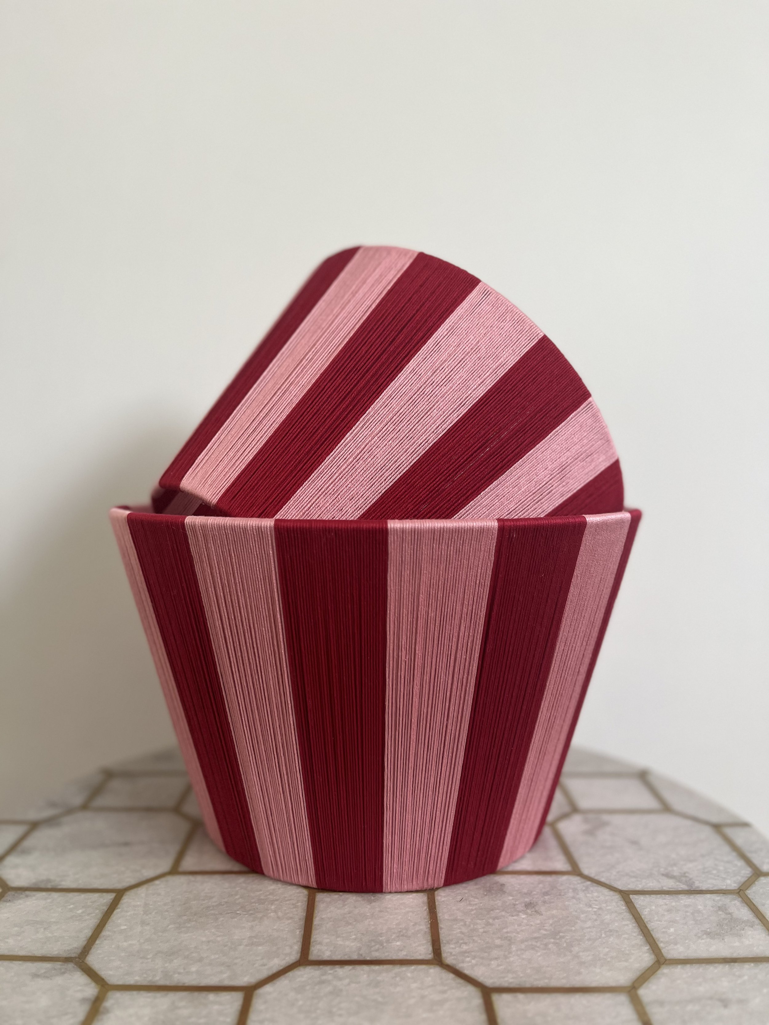 Two Cherry Kiss Red and Pink Striped String lampshades stacked on top of each other.