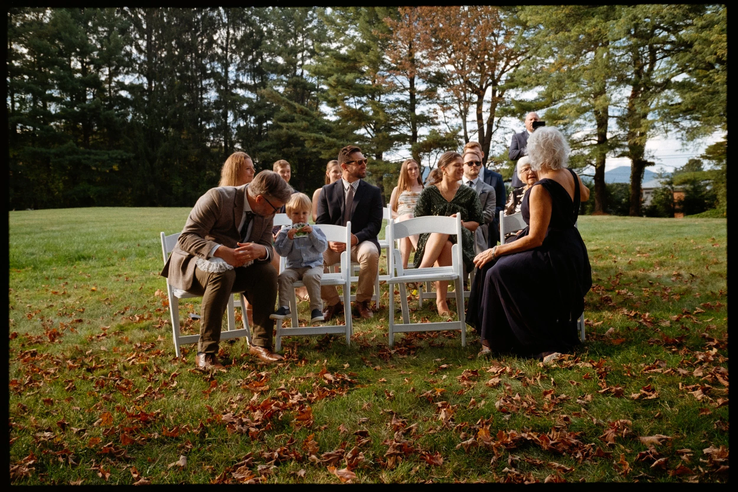 Cinematic film wedding photograph of guest waiting for bride by Edgardo a San Juan based photographer 