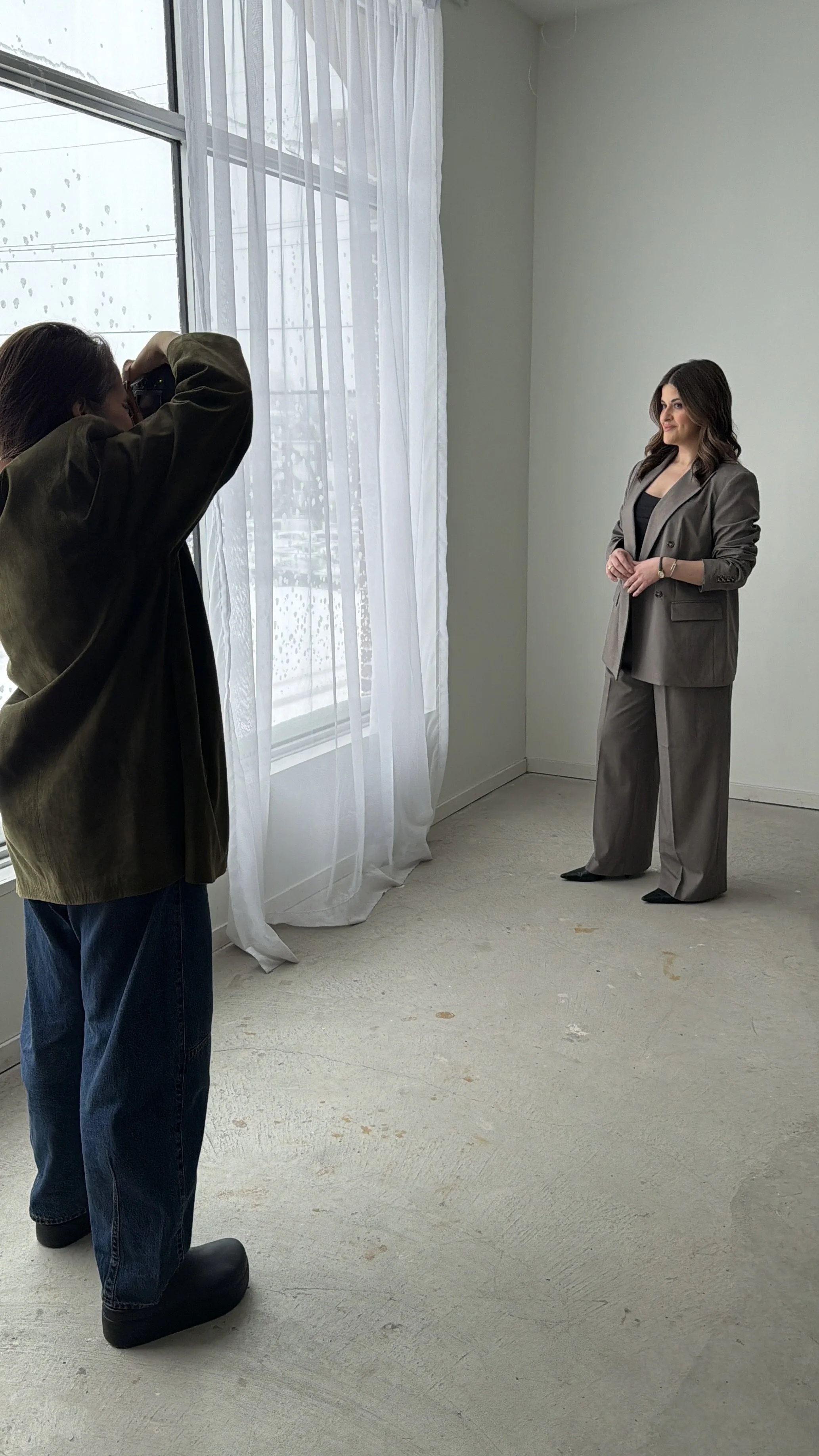 BTS photograph of Edmonton photograph taking professional female branding photos