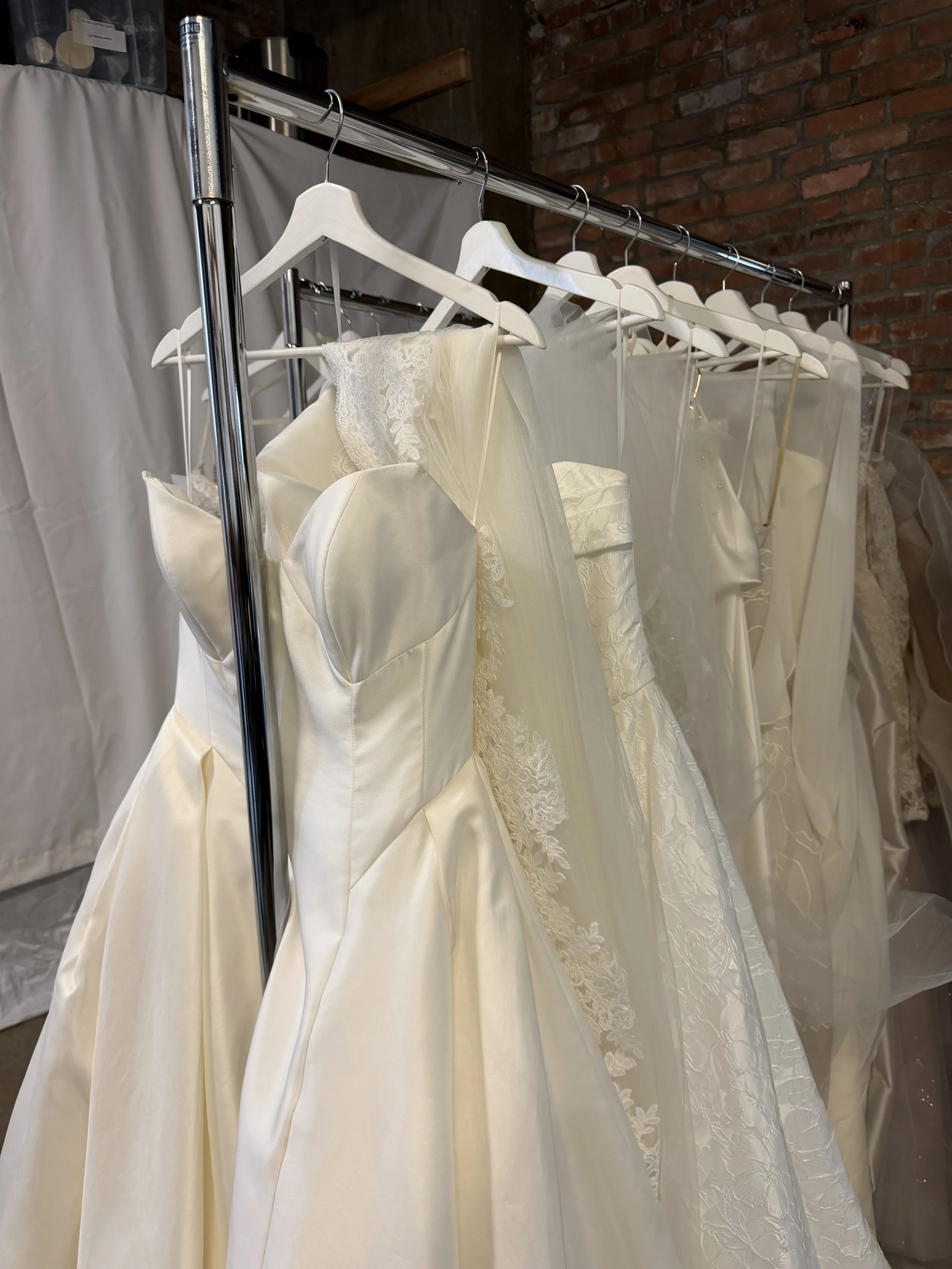 Backstage Hanging 2026 Wedding Bridal Dresses at Luxe Edit in YEG Alberta taken by Wildflower Events BTS and Content Creation