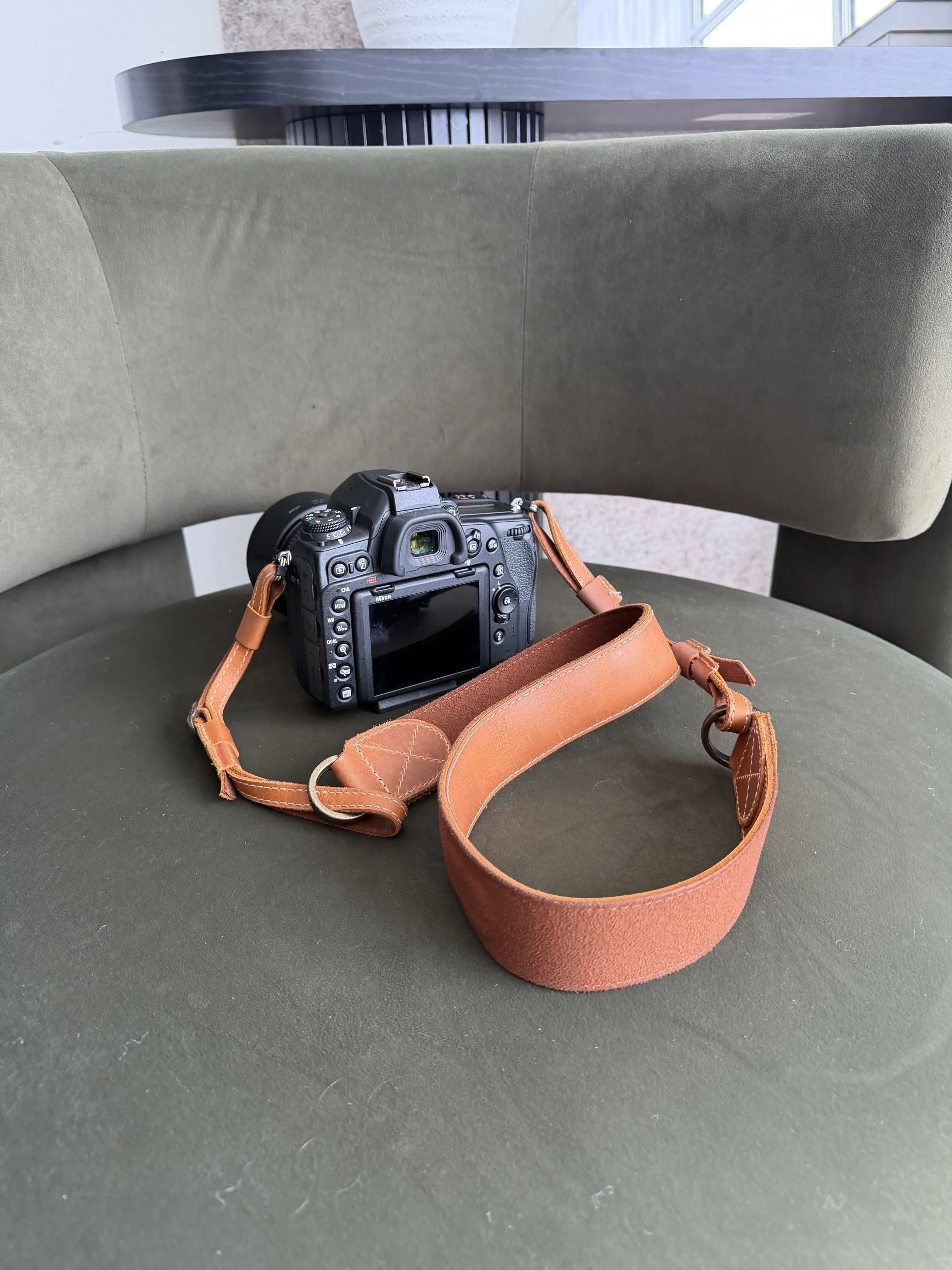 Behind the scenes photograph of professional camera on chair in Edmonton