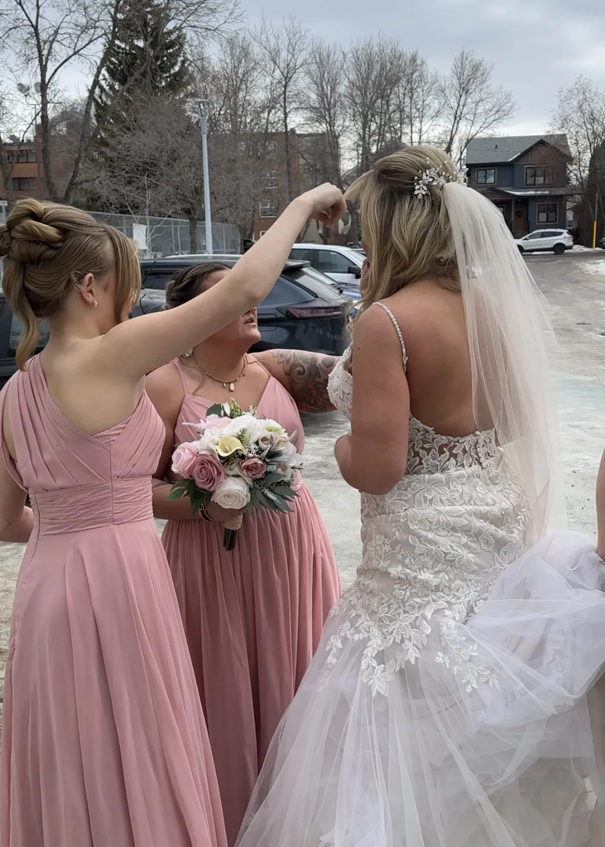 BTS photo of final moments with bridesmaids before she walks down the aisle