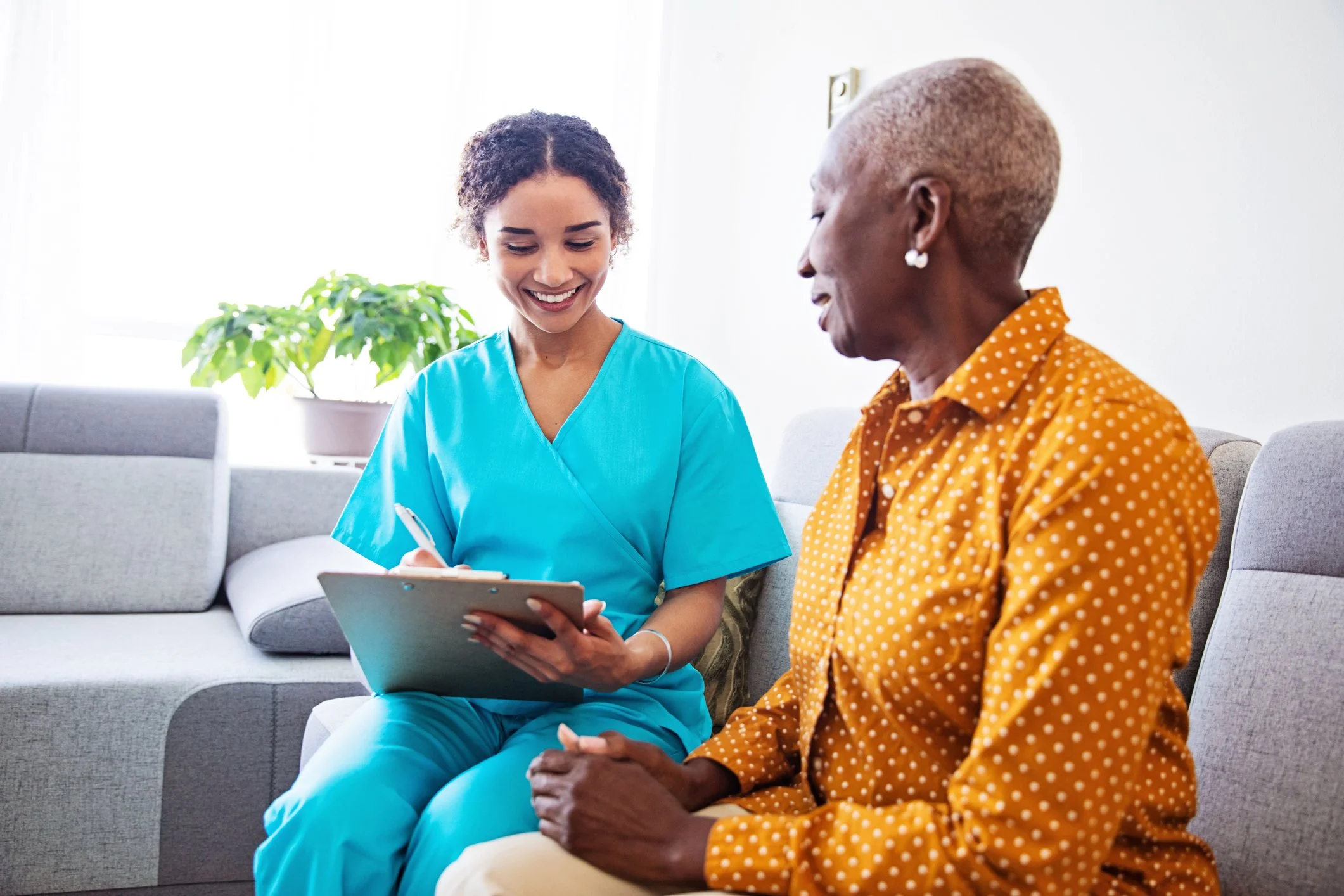 Patient reviewing questions about lung cancer risk with a healthcare provider.
