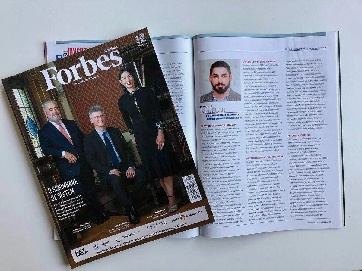Forbes magazine cover featuring three professionally dressed people, a man with glasses, a man with a beard, and a woman standing in a formal office setting.