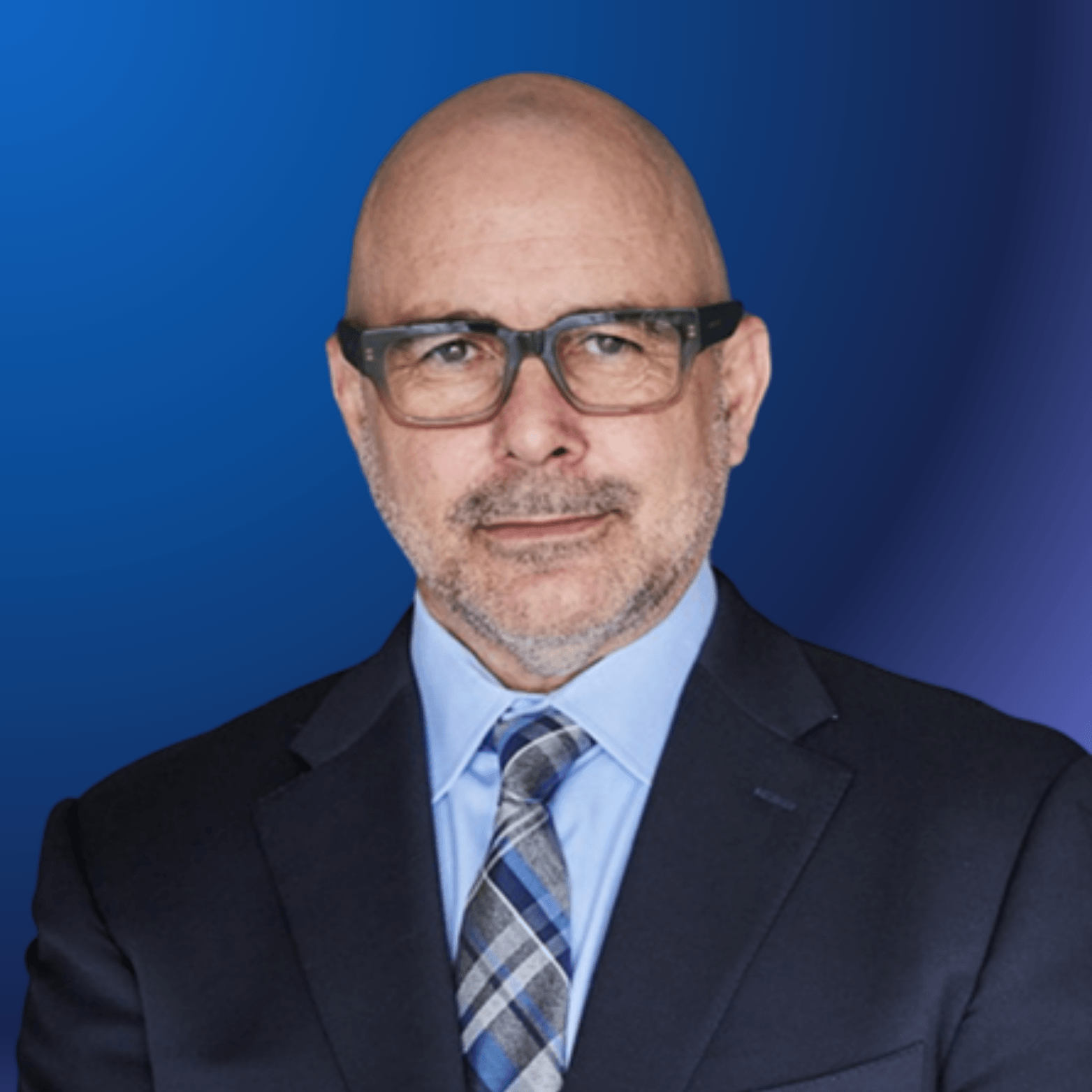 Joe Bellezzo professional headshot in suit and tie.