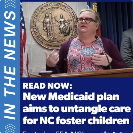 A woman speaking at a press conference behind a podium with a federal seal and an American flag in the background, discussing a new Medicaid plan for foster children in North Carolina.