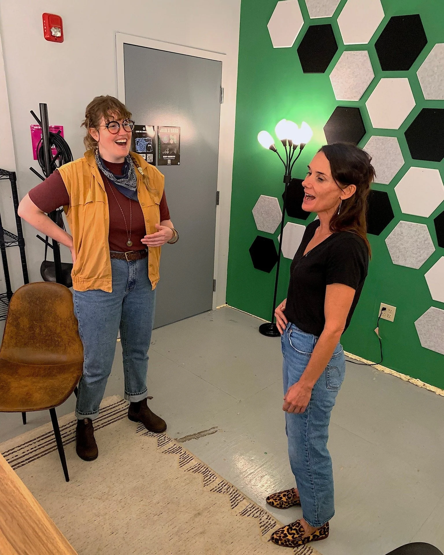 While you can't hear their lovely singing through these photos, Cate and Alex are seen practicing a pentatonic scale exercise along with a video resource. This exercise focuses on navigating through the vocal range while remaining mindful of breath c