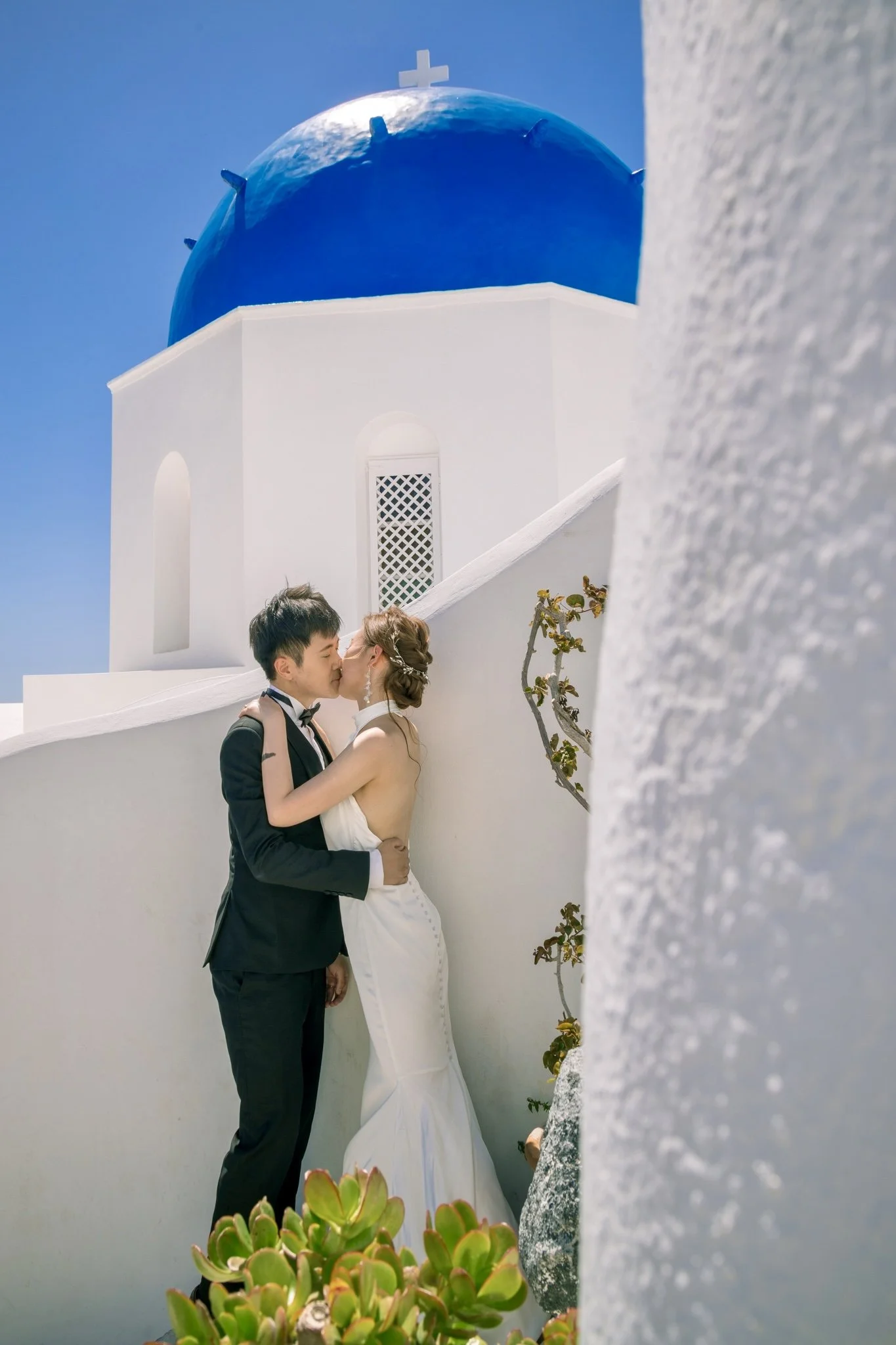 Private Santorini photo tour exploring whitewashed houses, domed churches, and panoramic cliffside landscapes.
