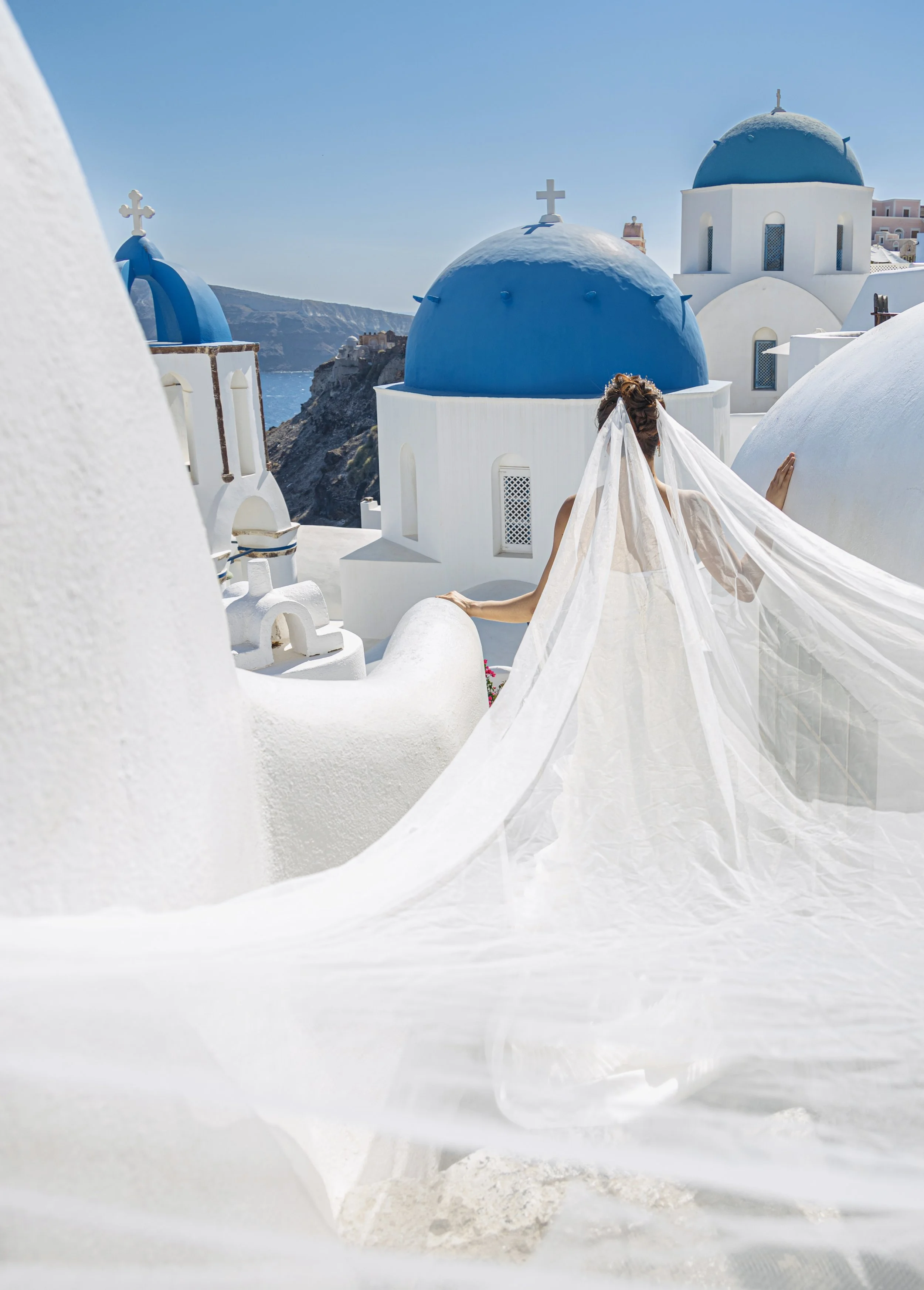 Blue domes of Oia captured during a private photo shoot in Santorini with a professional local photographer.