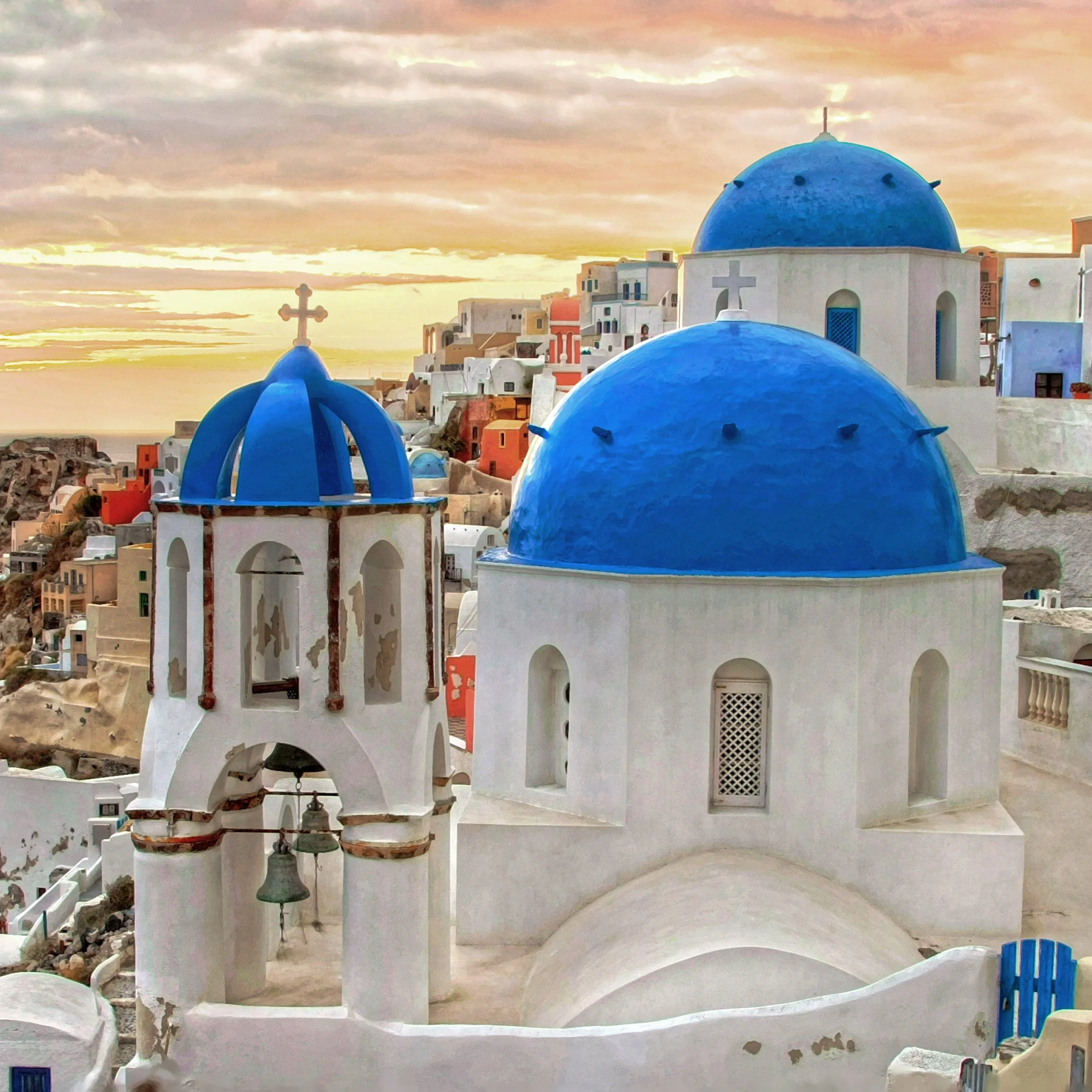 Panoramic Santorini caldera sunset over Oia with cliffside dining at Karma Oia, couples enjoying romantic terrace views and warm golden light.