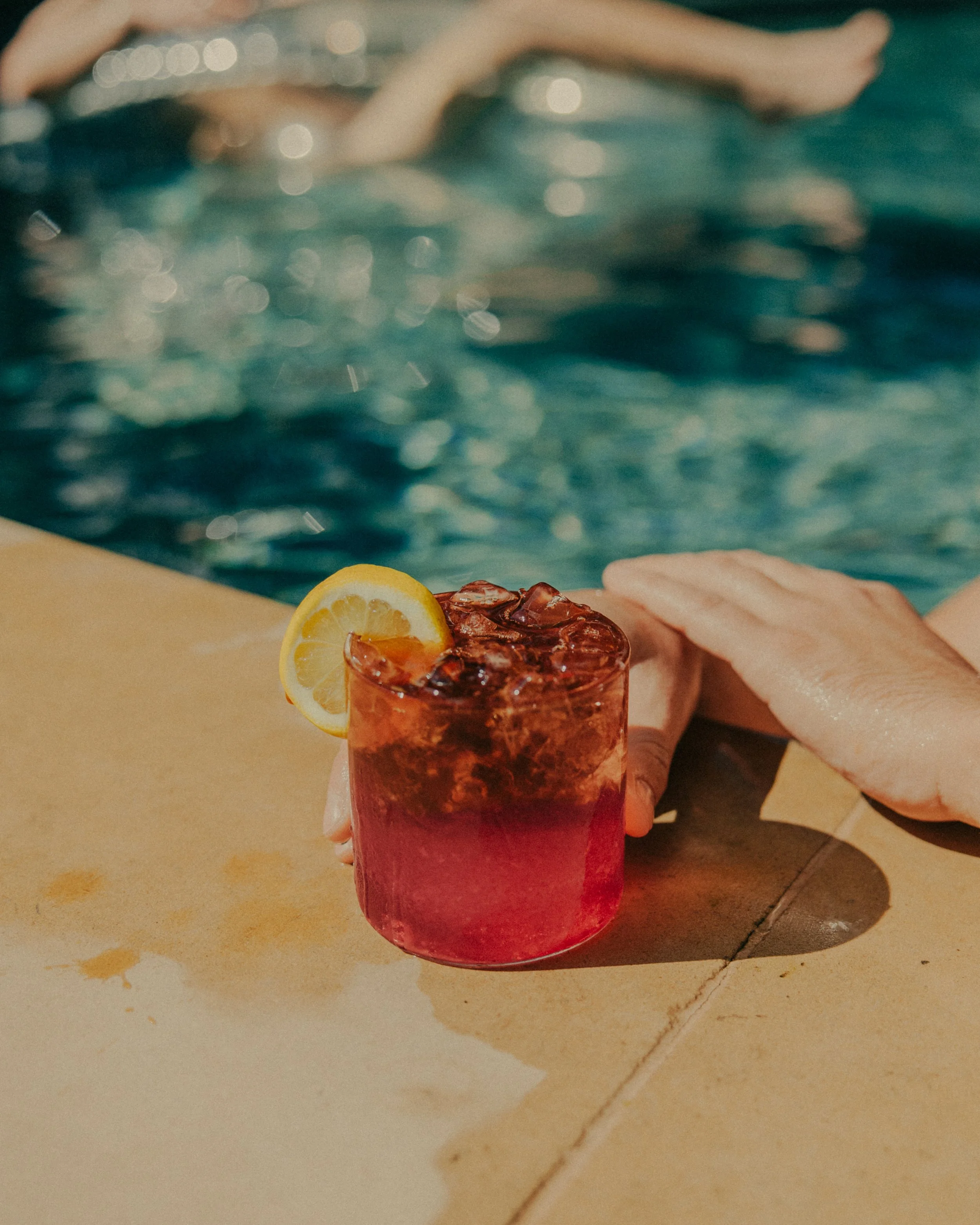 The Pool Boy with a cold brew floatie
