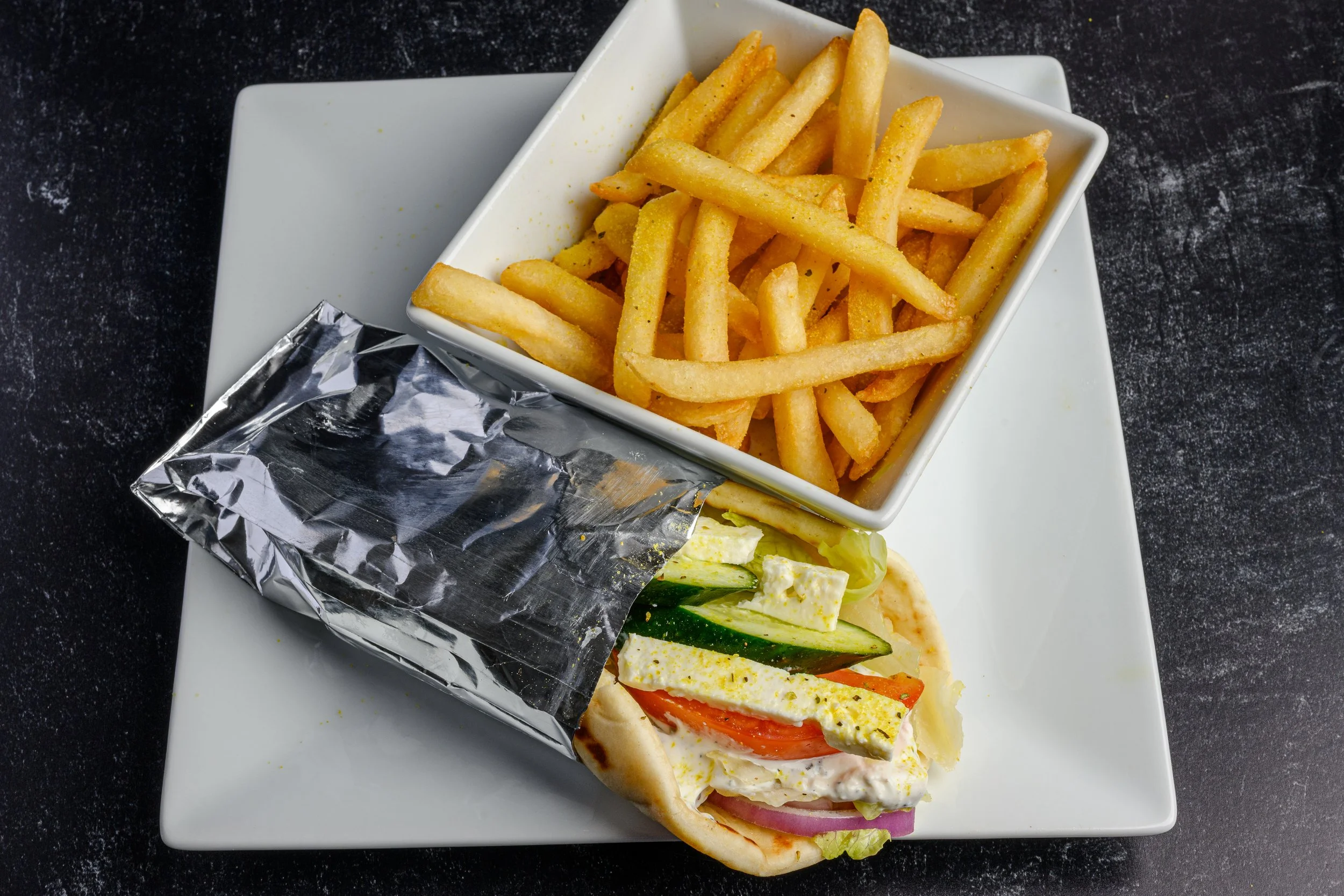 || #2 COMBO MEAL OPTION ||

Veggie Pita Sandwich + Fries Topped w/ Lemon Zest + Drink