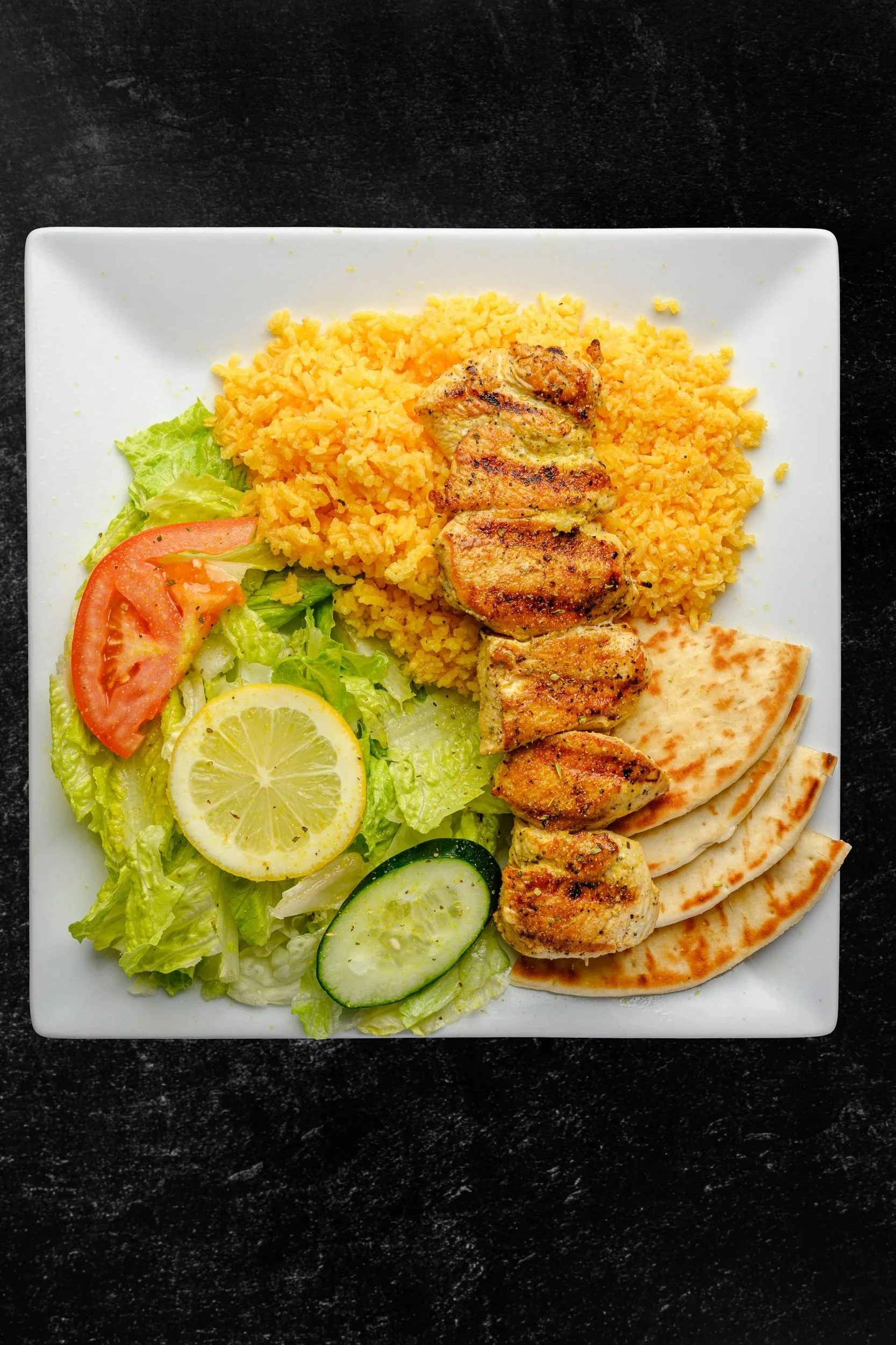 || #7 SINGLE CHICKEN SOUVLAKI PLATE || One Skewer { Chicken or Pork } + Side of Rice + Pita Bread + Side of Salad W/ House Made Greek Dressing 