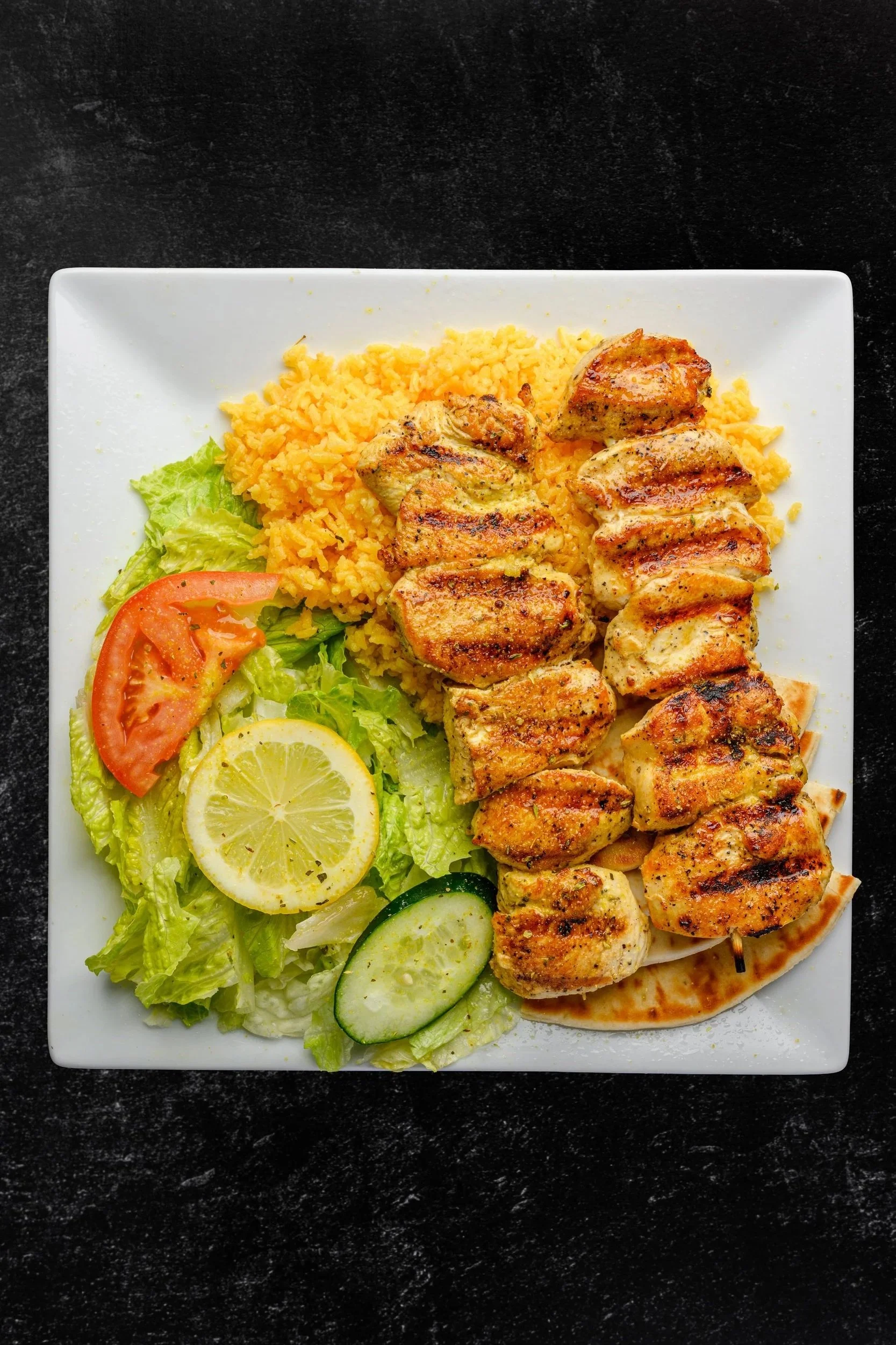 || #1 DOUBLE CHICKEN SOUVLAKI PLATE || Two Skewers { Chicken or Pork } + Side of Rice + Pita Bread + Side of Salad W/ House Made Greek Dressing 