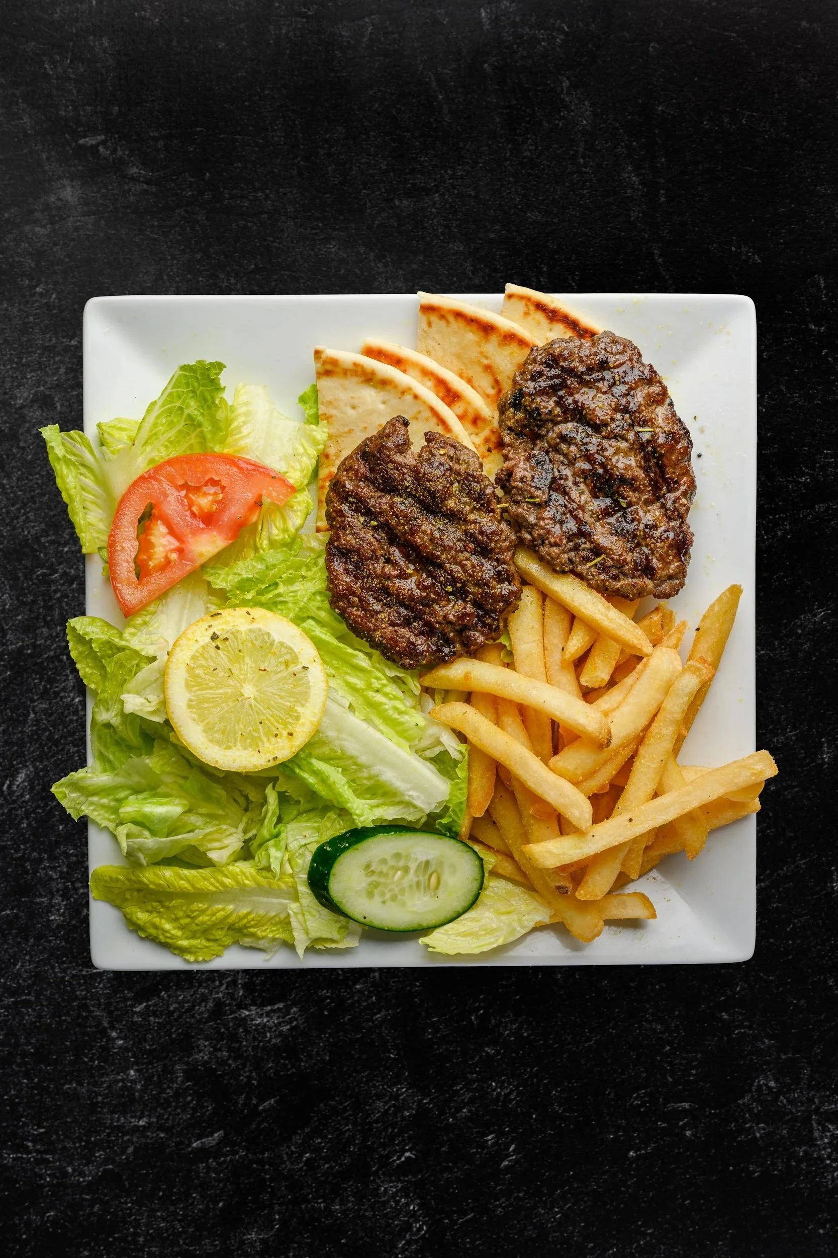 || #9 GREEK KABOB || Two Beef Patties + Side of Rice OR Fries + Pita Bread + Side of Salad W/ House Made Greek Dressing 