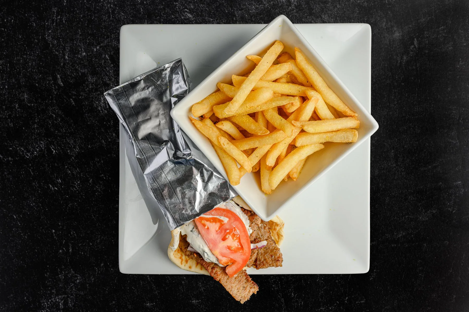 || #2 COMBO MEAL OPTION ||

Traditional Gyro Sandwich + Fries Topped w/ Lemon Zest + Drink