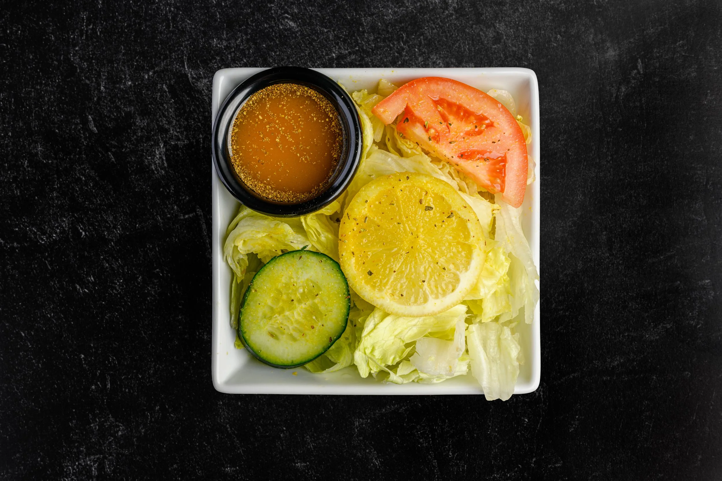 || SIDE SALAD || Iceberg Lettuce + Tomato + Cucumber + W/ House Made Greek Dressing 