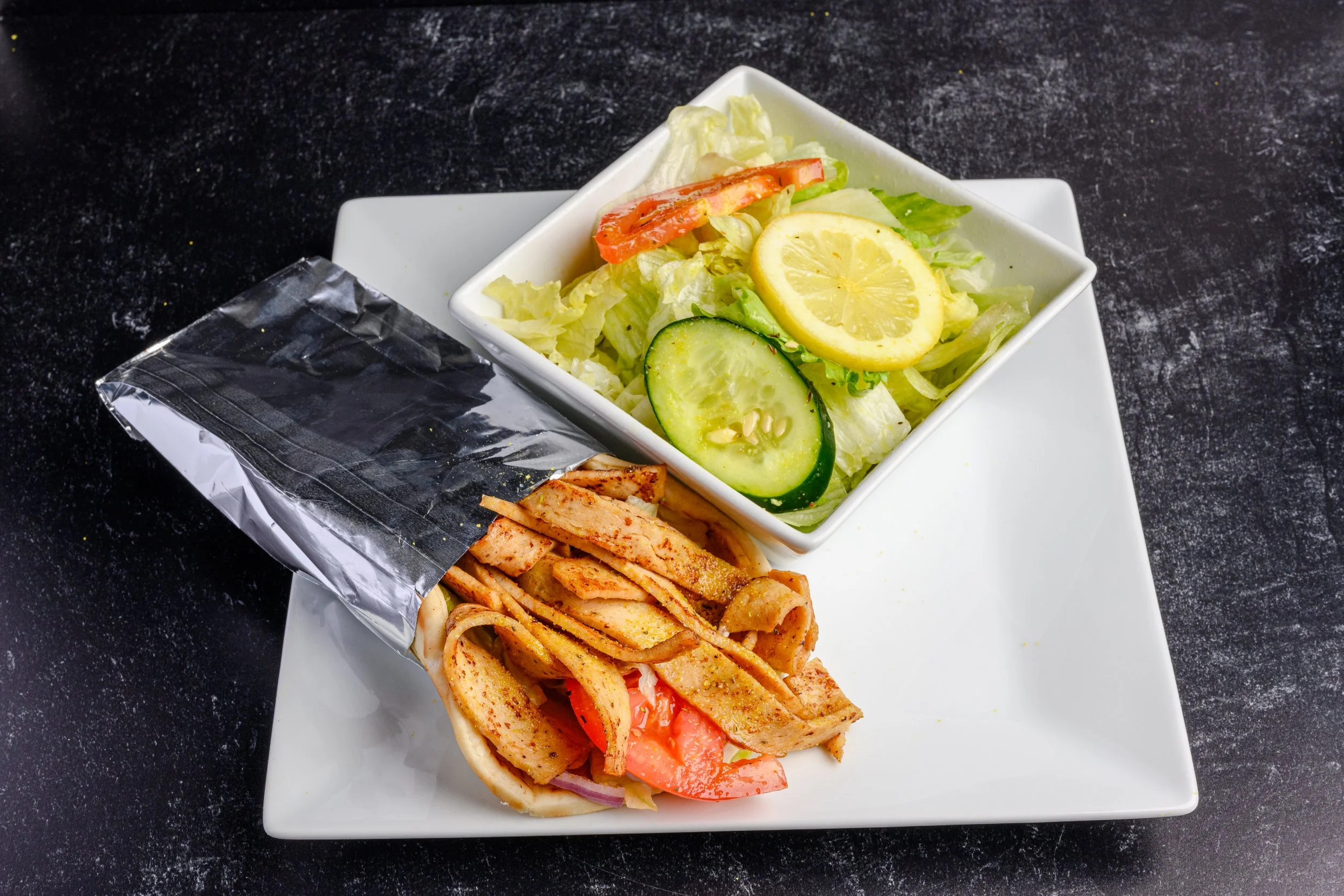 || #2 COMBO MEAL OPTION ||

Chicken Gyro Sandwich + Side Salad  W/ House Made Greek Dressing + Drink