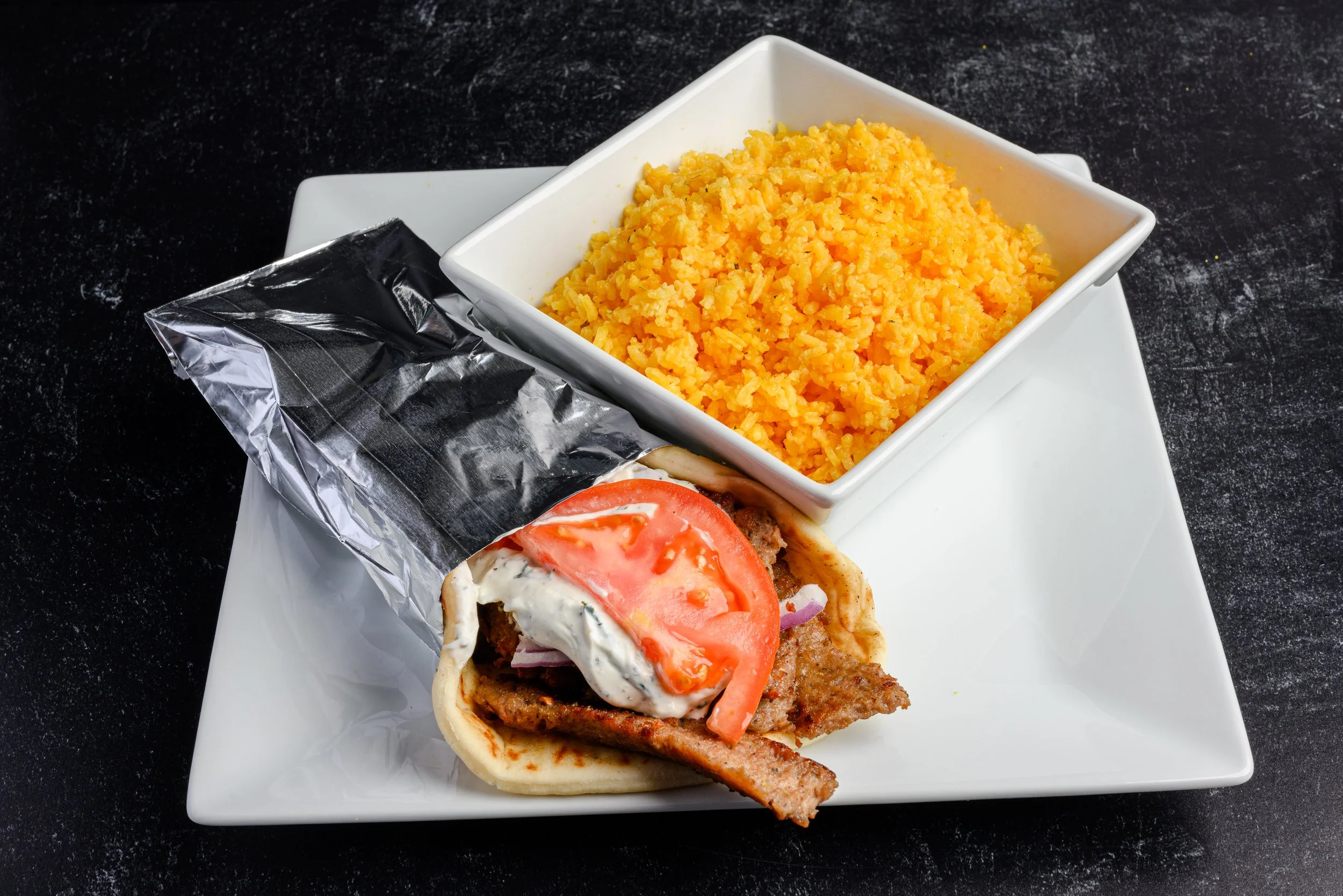 || #2 COMBO MEAL OPTION ||

Traditional Gyro Sandwich + Side Of Lemon Rice + Drink