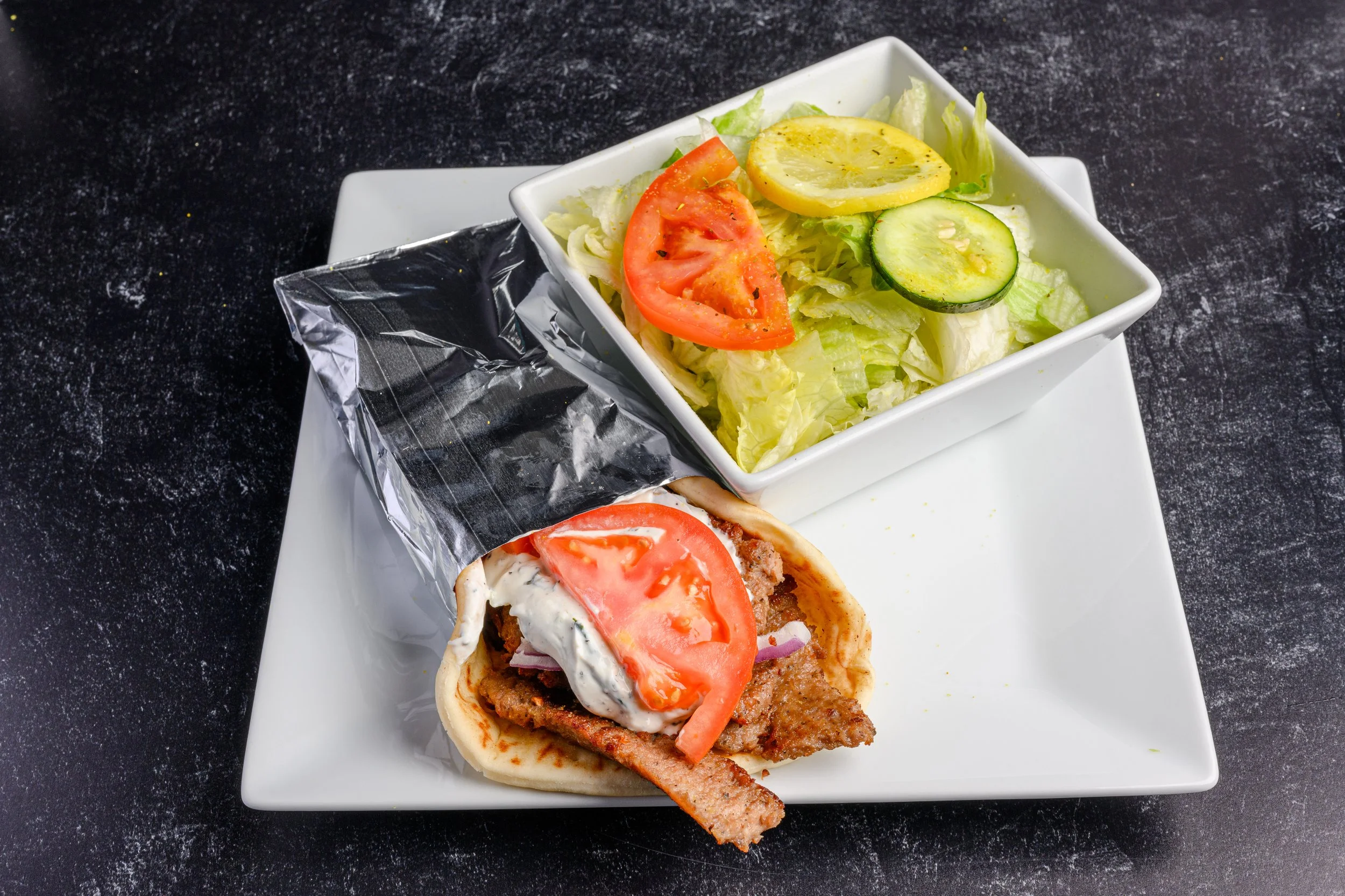|| #2 COMBO MEAL OPTION ||

Traditional Gyro Sandwich + Side Salad  W/ House Made Greek Dressing + Drink