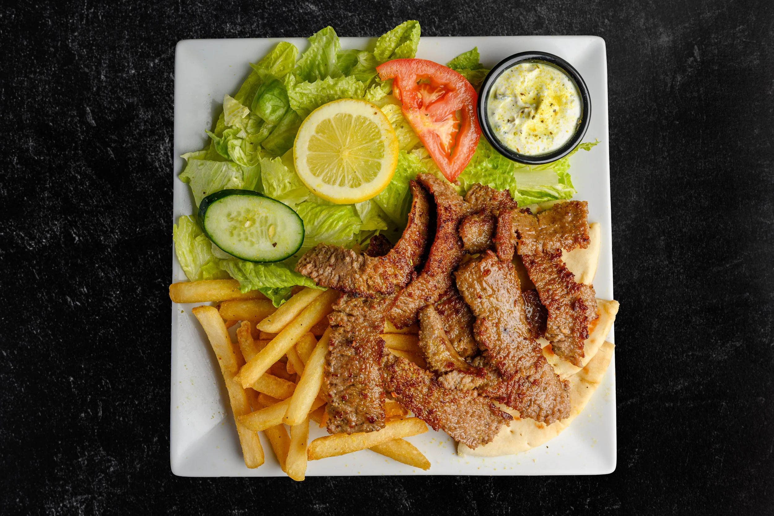 || #5 GYRO PLATE || Gyro Meat + Side of Rice OR Fries + Pita Bread + Side of Salad W/ House Made Greek Dressing + Comes with Tzatziki Sauce 
