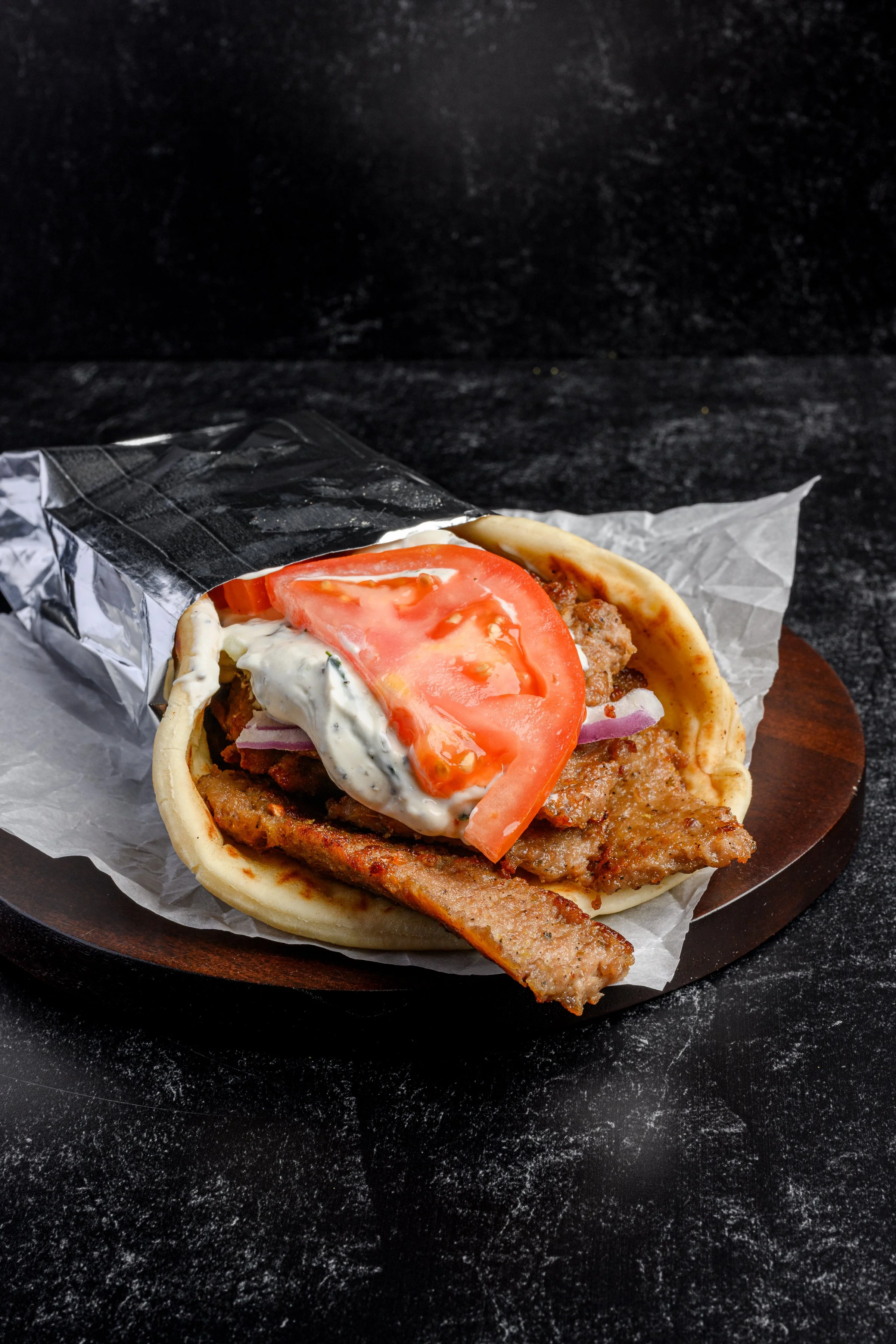 || TRADITIONAL GYRO SANDWICH ||

Gyro Meat, Red Onion, Tomato, and Our House Made Tzatziki Sauce All Wrapped Into a 7" Pita Bread. 
 | Most Popular |

* Gluten Contained in pita bread and gyro meat 