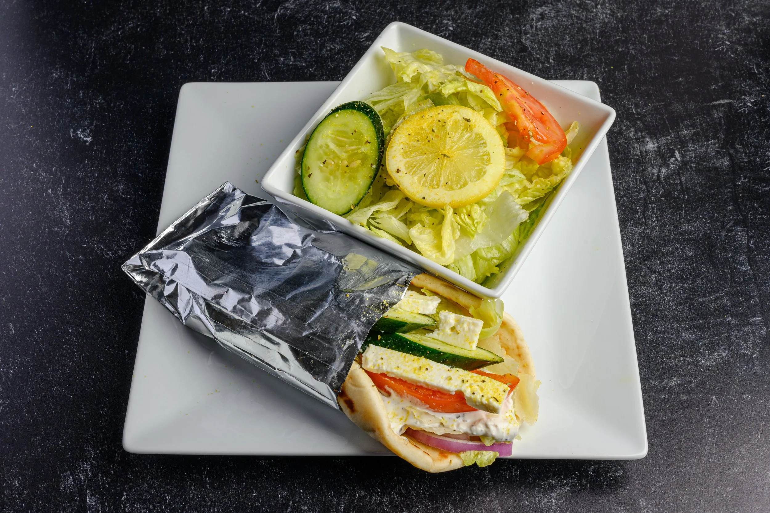 || #2 COMBO MEAL OPTION  ||

Veggie Pita Sandwich + Side Salad  W/ House Made Greek Dressing + Drink