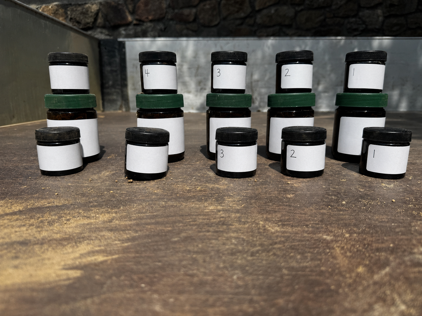 Soil sample jars prepared for laboratory analysis in Guernsey