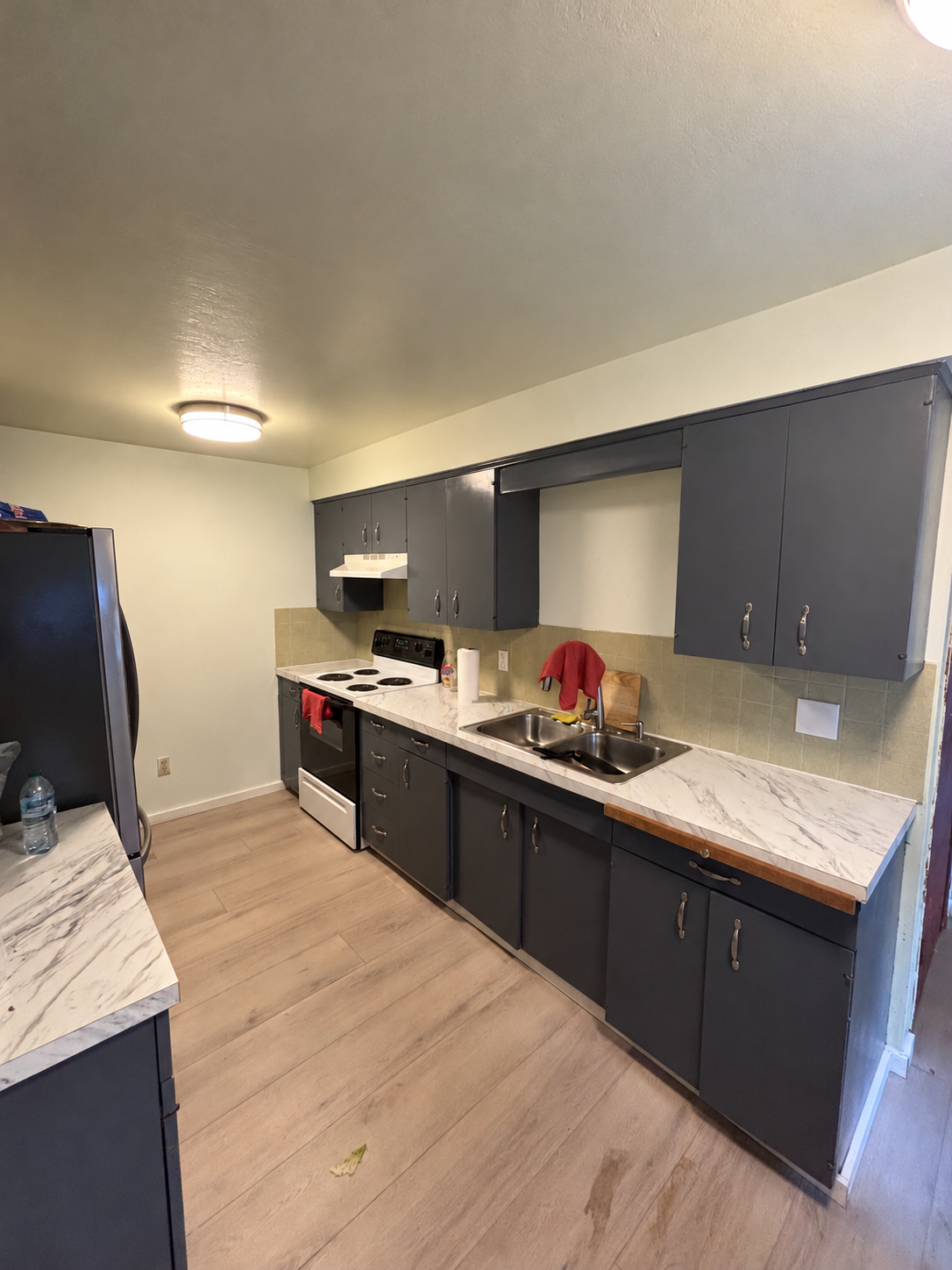 Seamlessly Repaired Galley Kitchen.png