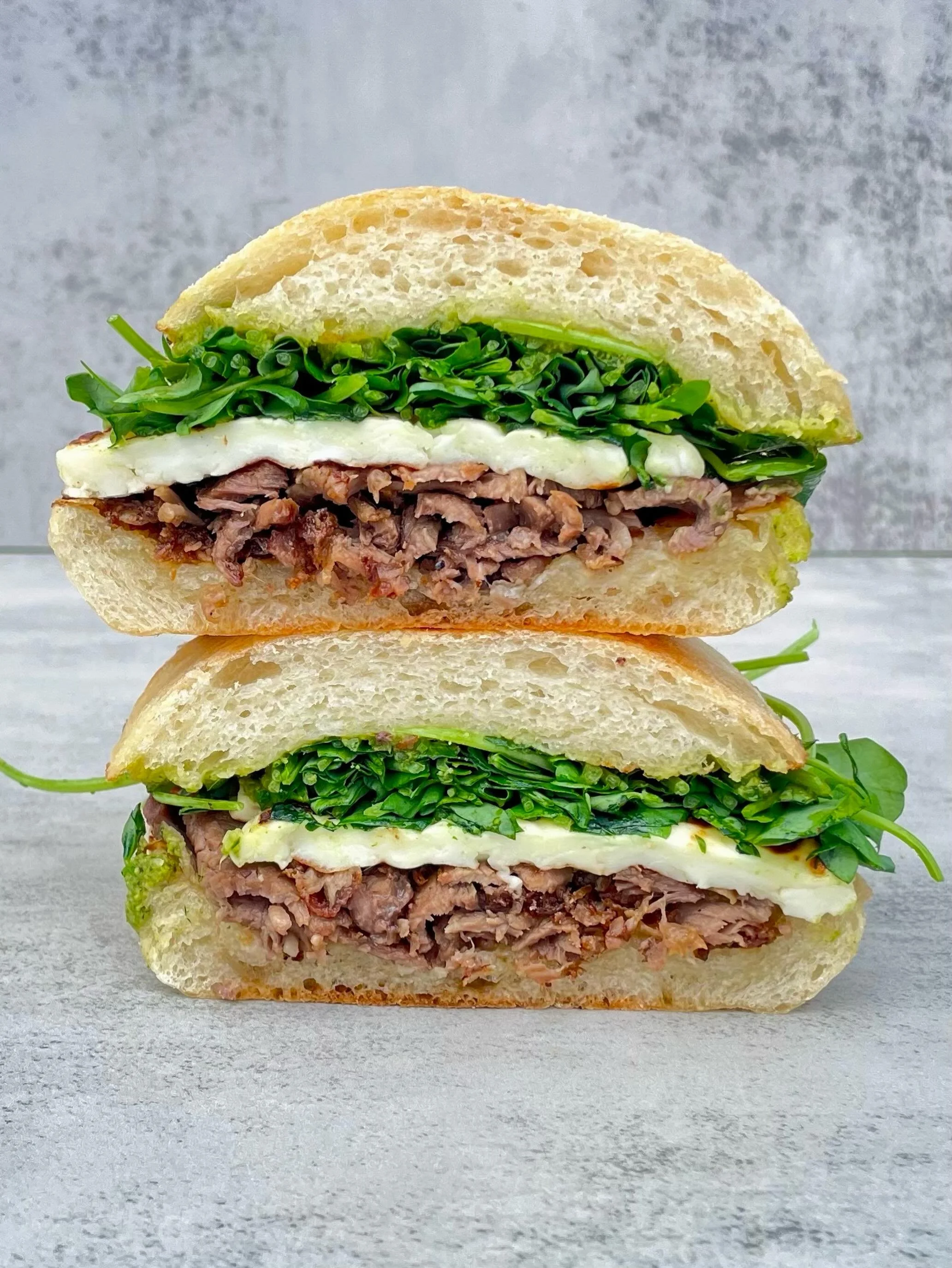 It&rsquo;s back *Lambda Lambda Lambda* 

roasted leg of lamb, griddled halloumi, mint sauce, @dna_deschutes_produce pea shoots, butter toasted @oneloafbend sourdough ciabatta bread