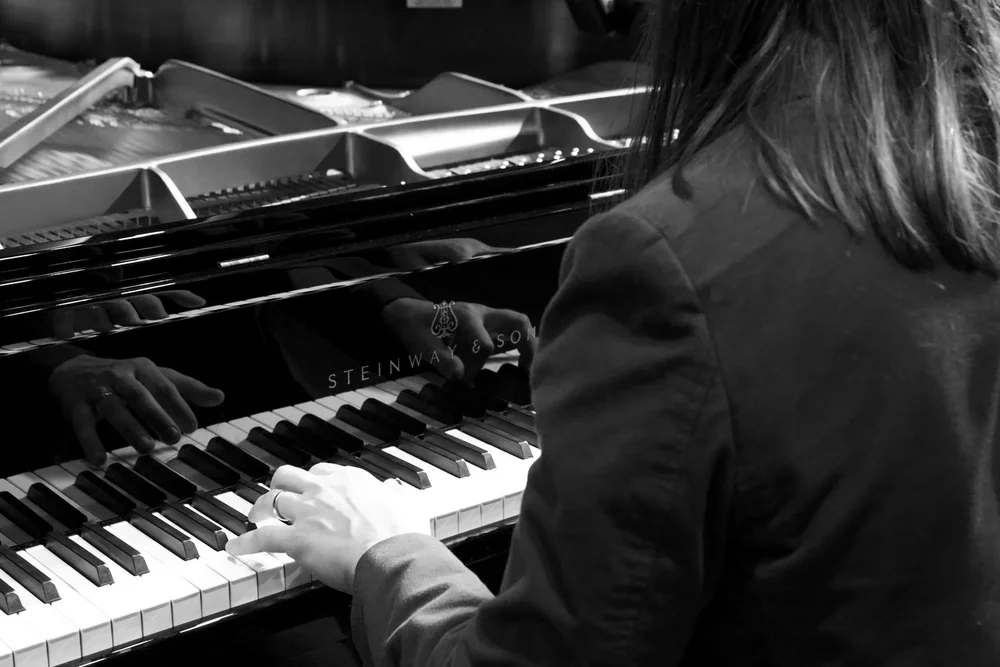 Hands at the piano keys at PVT Studio