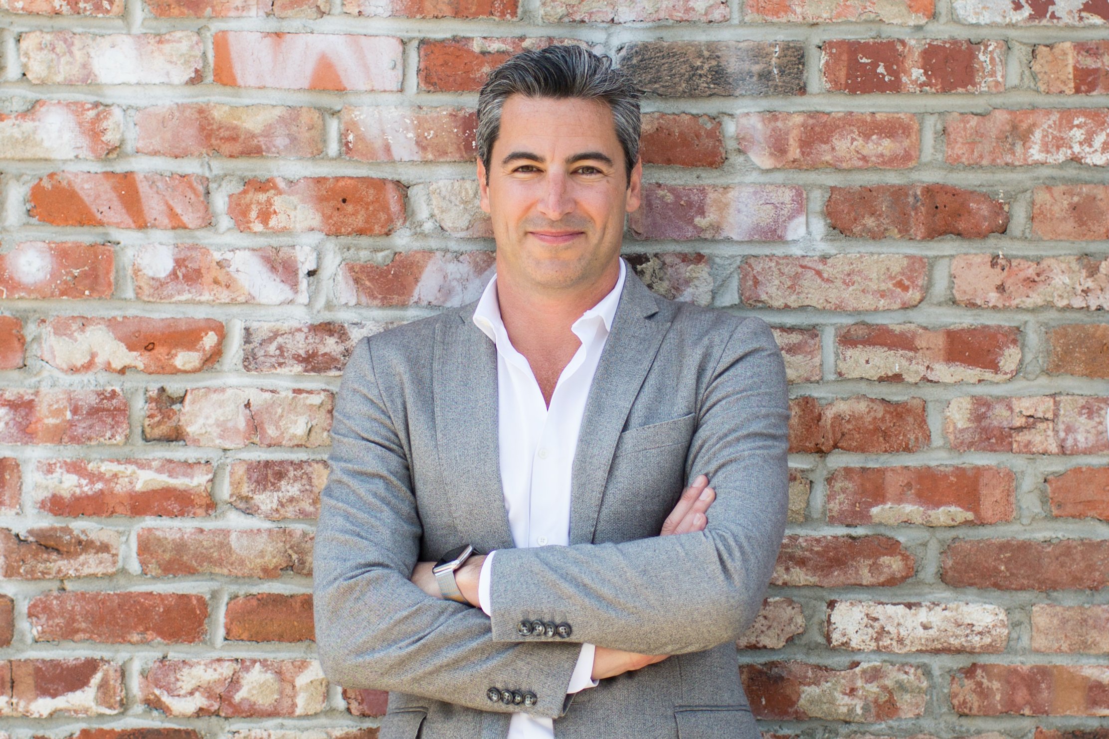 Headshot of our founder