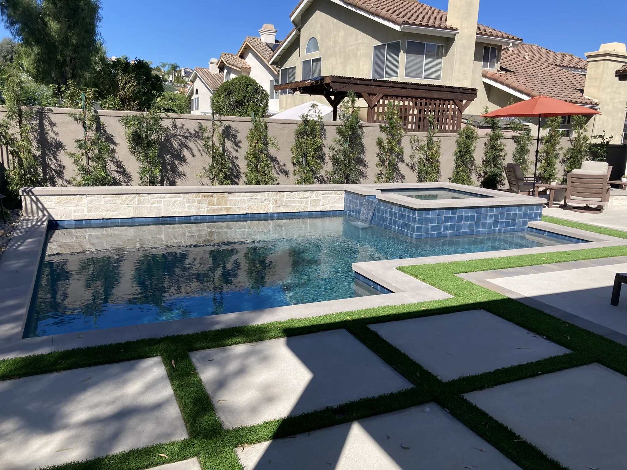After Photo of backyard pool and spa