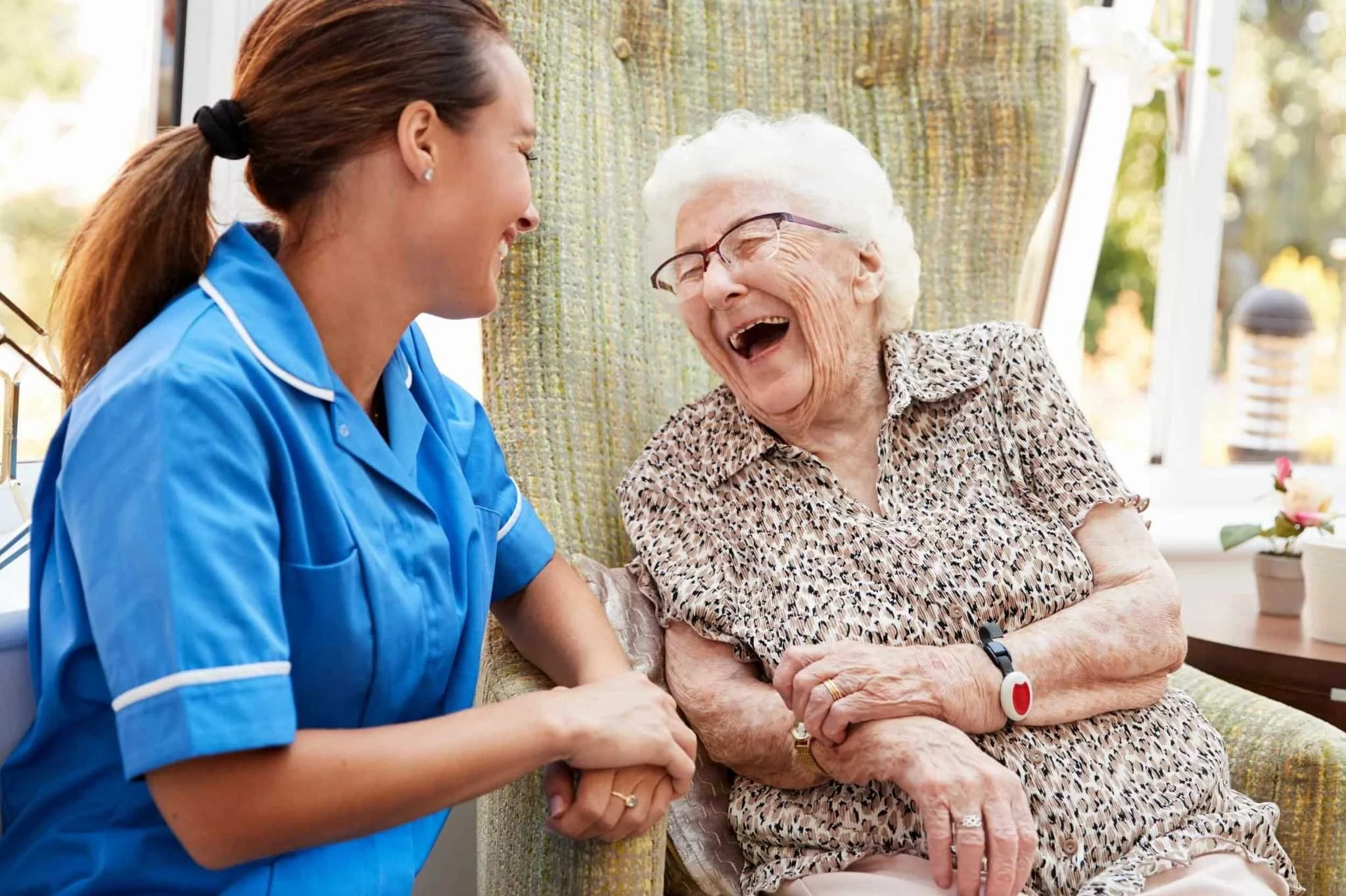 Professional caregiver assisting an older adult at home in Phoenix, Arizona. Handled Home Care provides home care services, senior care, dementia care, Alzheimer's support, respite care, personal care assistance, meal preparation, transportation, and