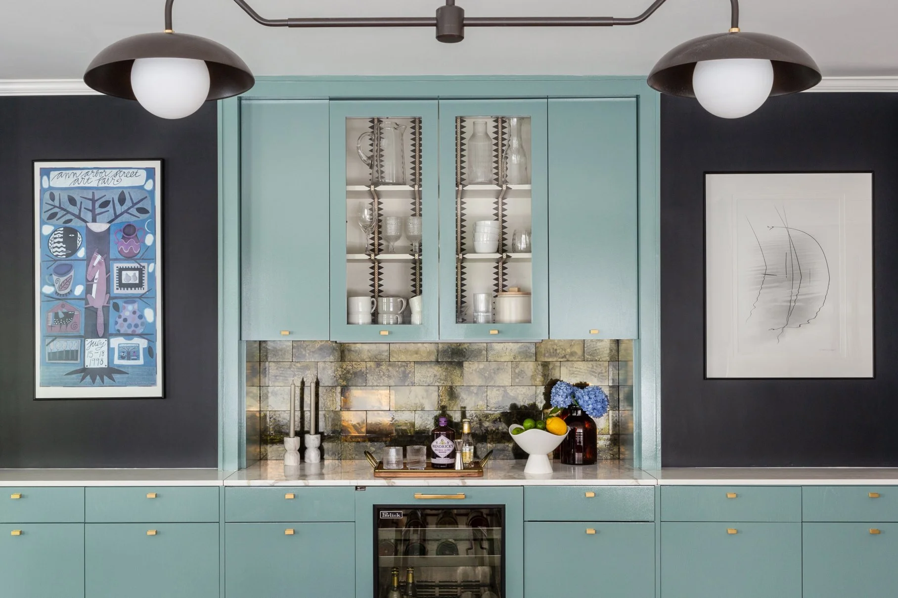 A built-in dining room bar is painted Oval Room Blue by Farrow & Ball.