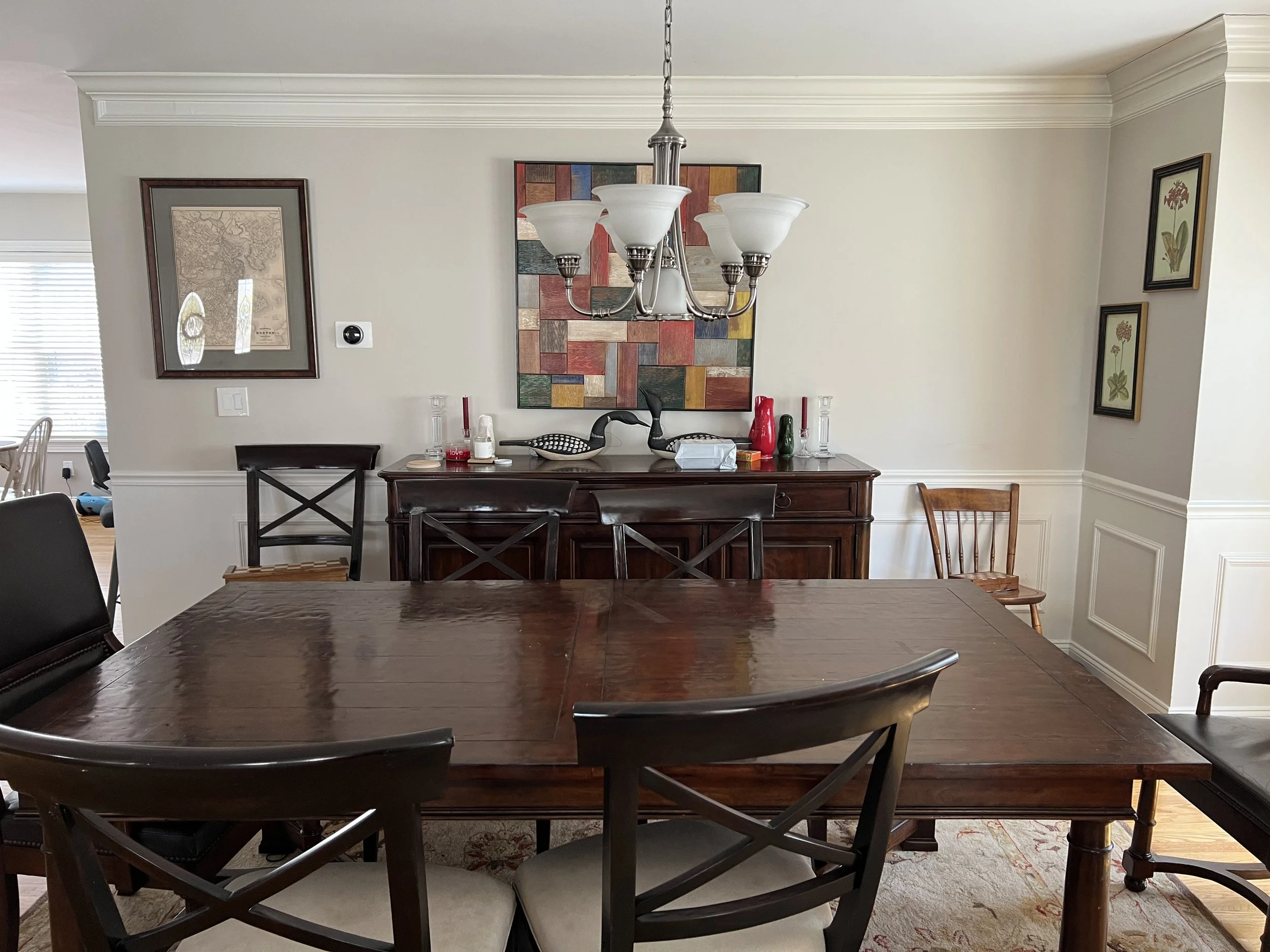 The original dining room with dark furniture