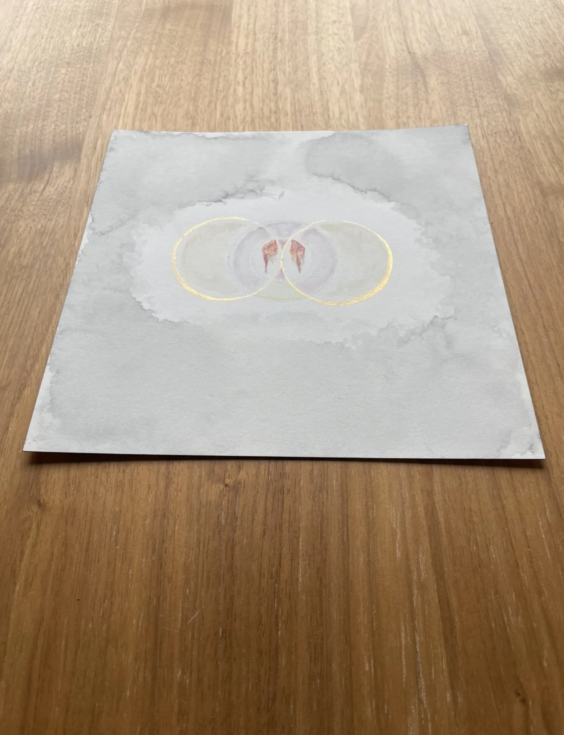 Torn wings in golden rings 