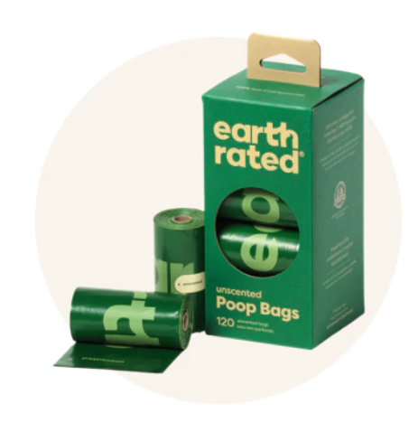 Box of Earth Rated unscented poop bags with three green rolls of bags in front.