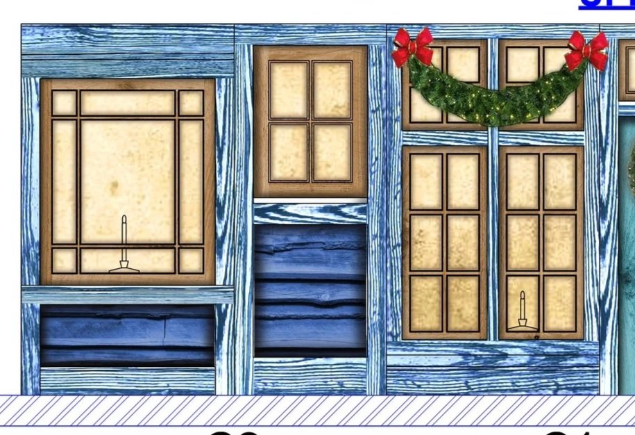 Decorative window display with blue wooden panels, Christmas greenery with red bows, and candleholder cutouts in the window panes.