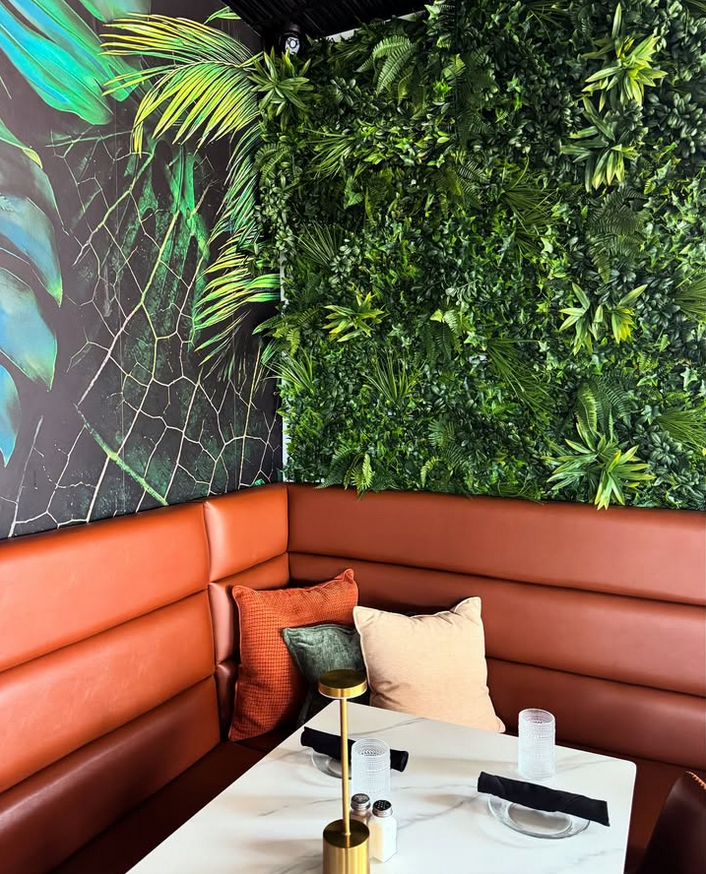 Leather booths and a living green wall at Jocelyn's