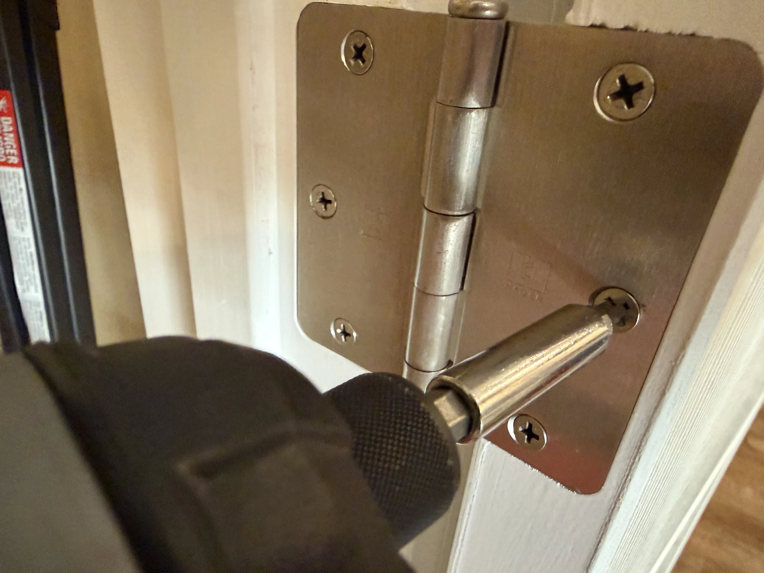 A professional installation setup featuring protective work gloves and a precision tool kit, representing SLLET Solutions' commitment to safety and asset protection.