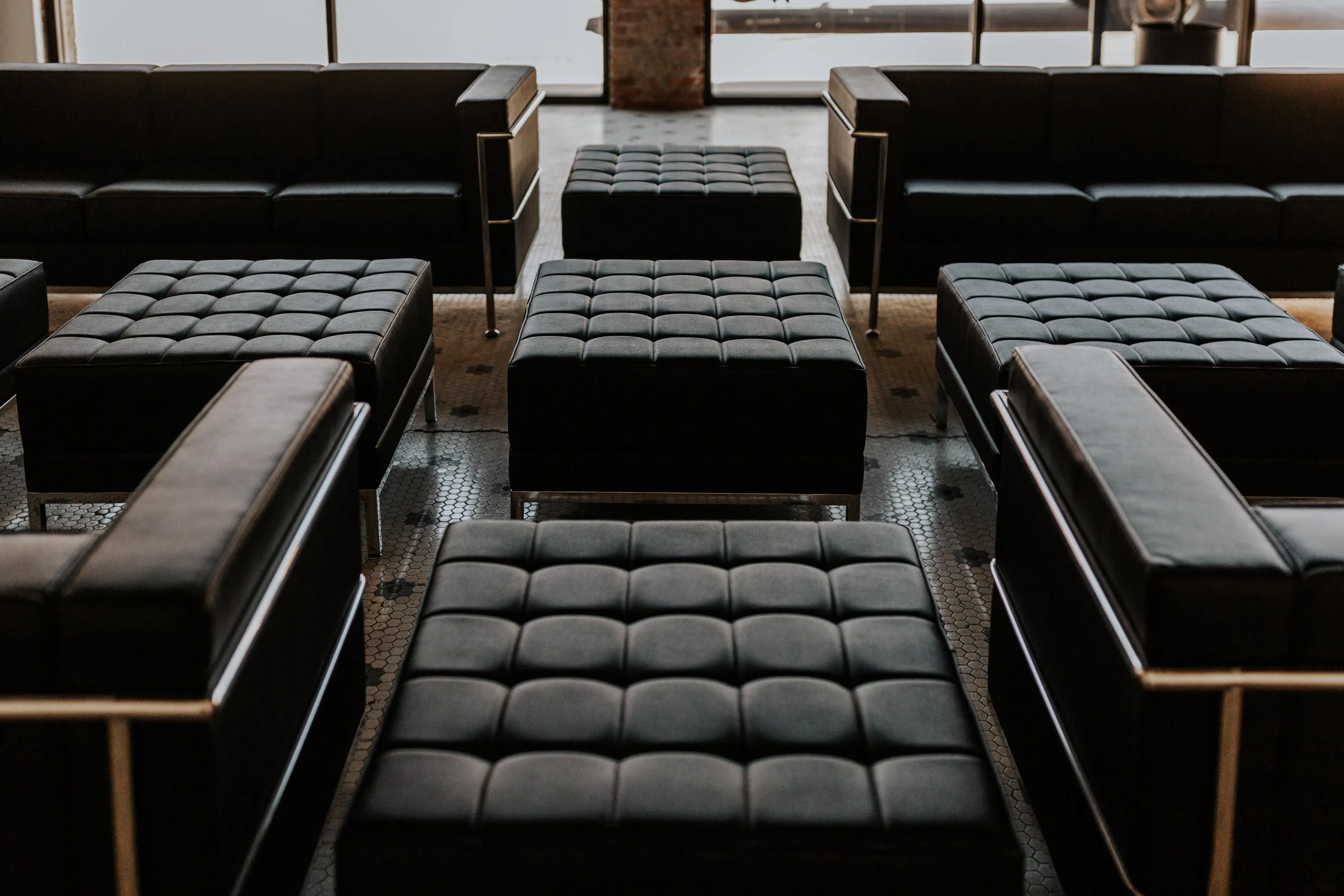 Black Leather Ottoman (1).jpg