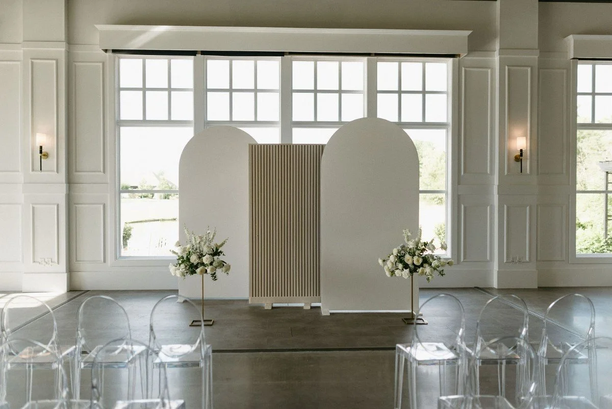 White Arched Walls + Cream Fluted Wall + Ghost Chairs.jpg