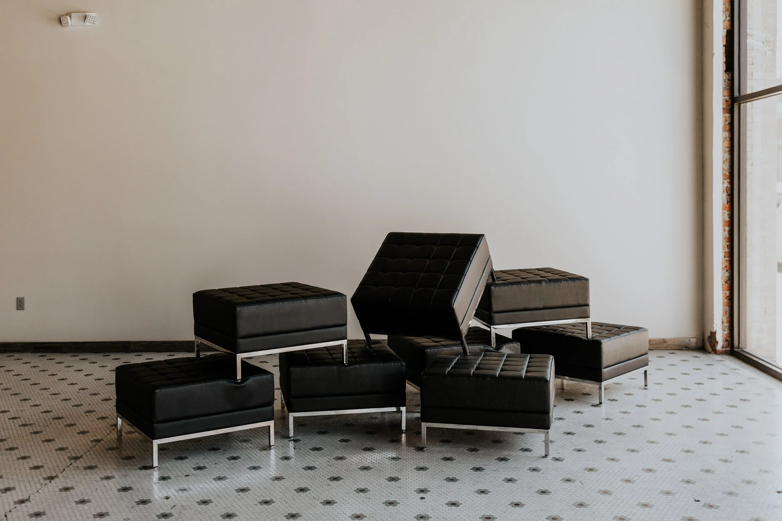 Black Leather Ottoman.jpg
