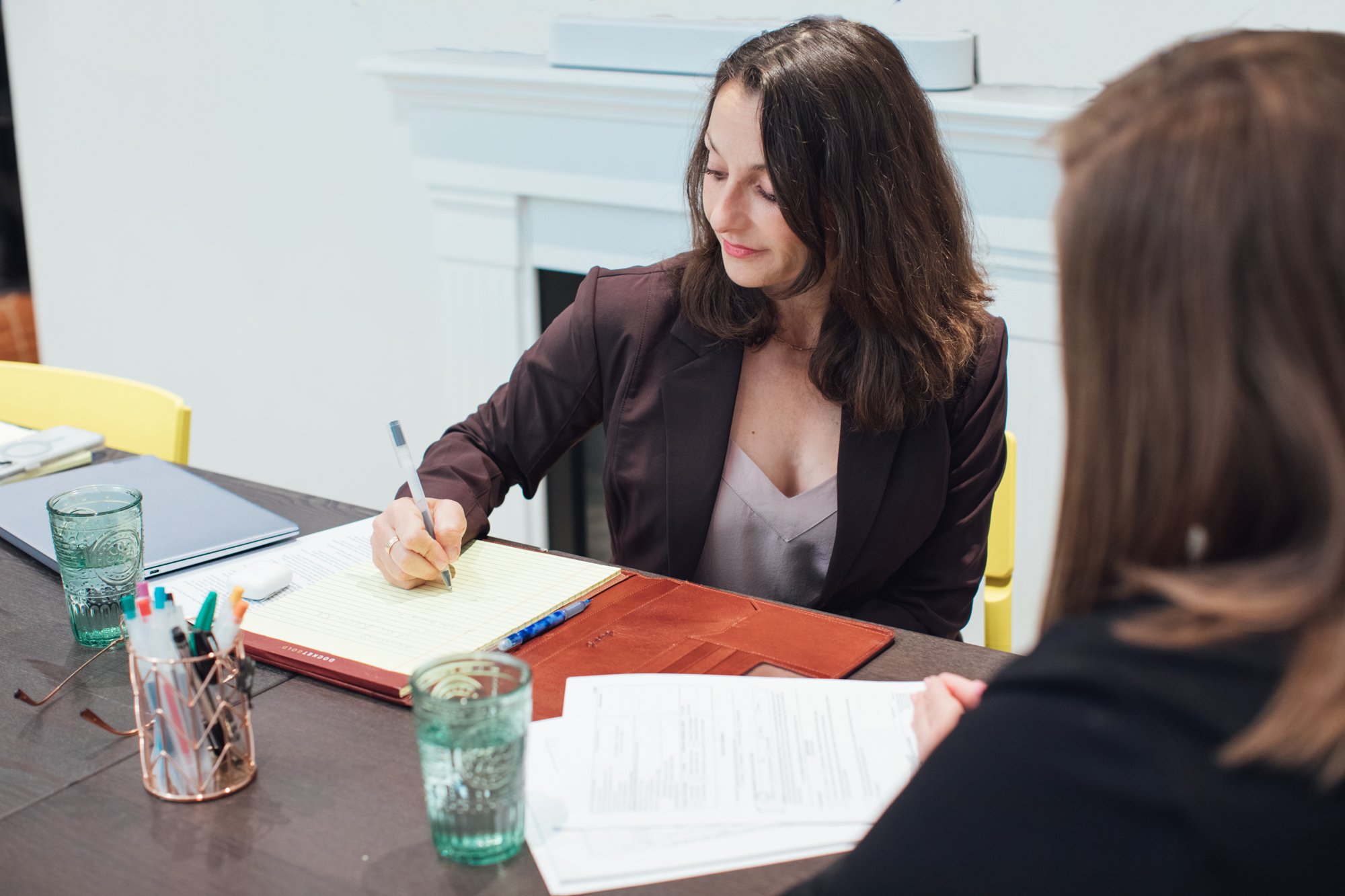 a man on his computer with a credit card