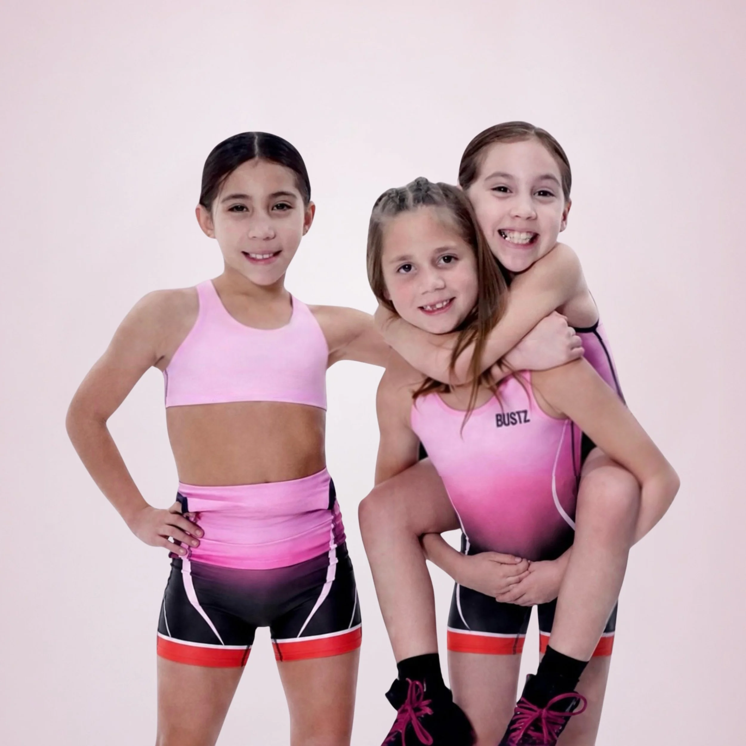 Girls shades of pink freestyle singlet (4).jpg